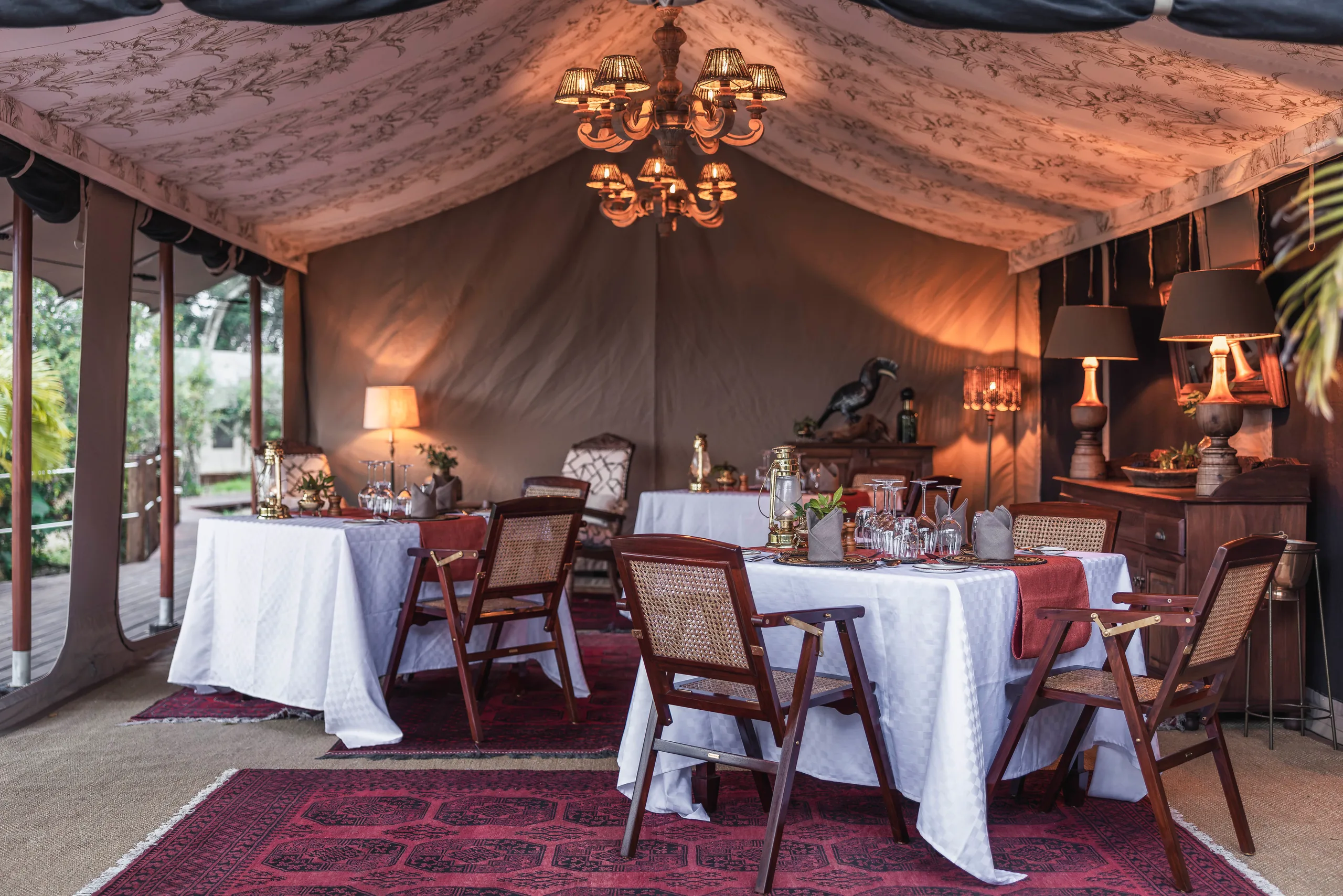 The dining tent set for an evening meal at Little Elephant Pepper Camp