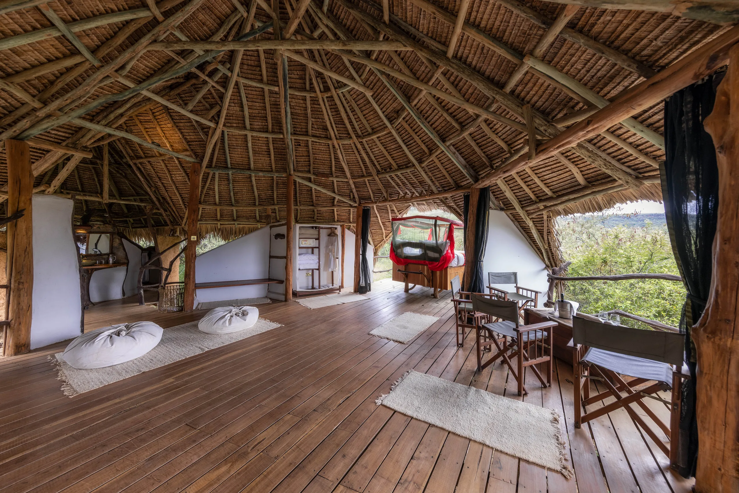 The open family room with its bed and sitting area at Loisaba Star Beds