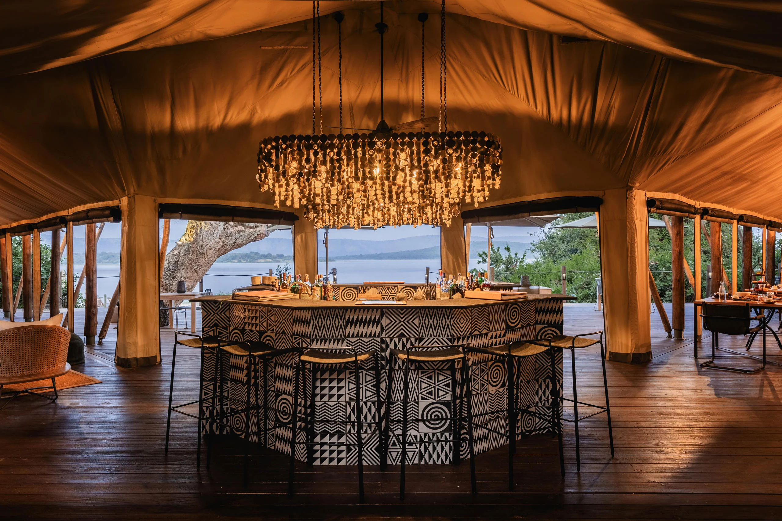 The bar and lounge tent with the lake beyond