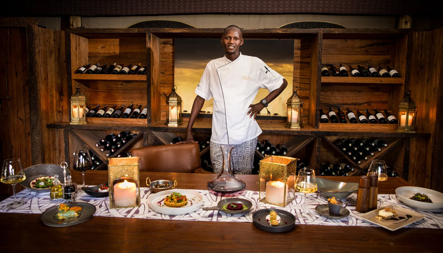 A chef at the camp kitchen counter