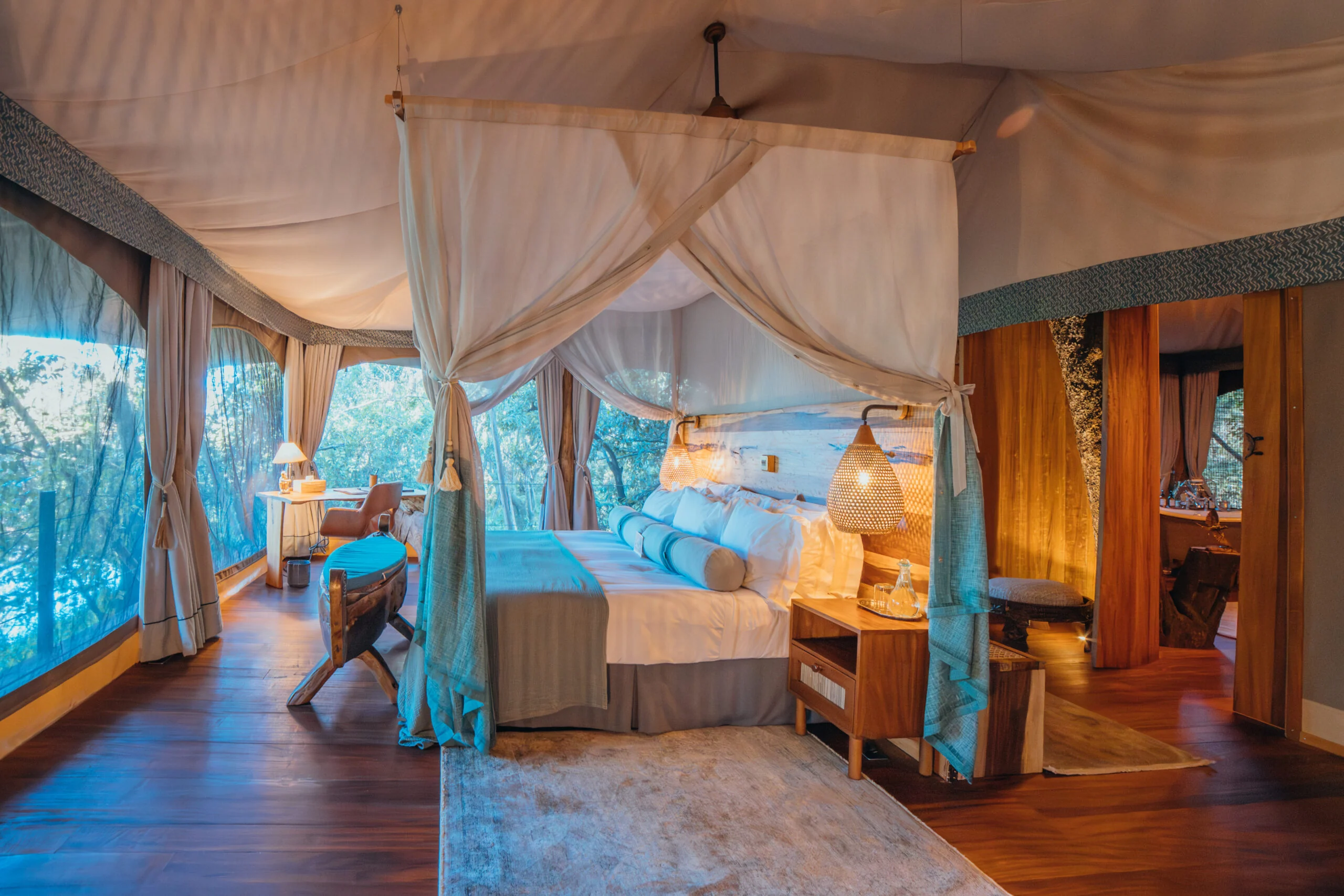 A tent bedroom among the trees