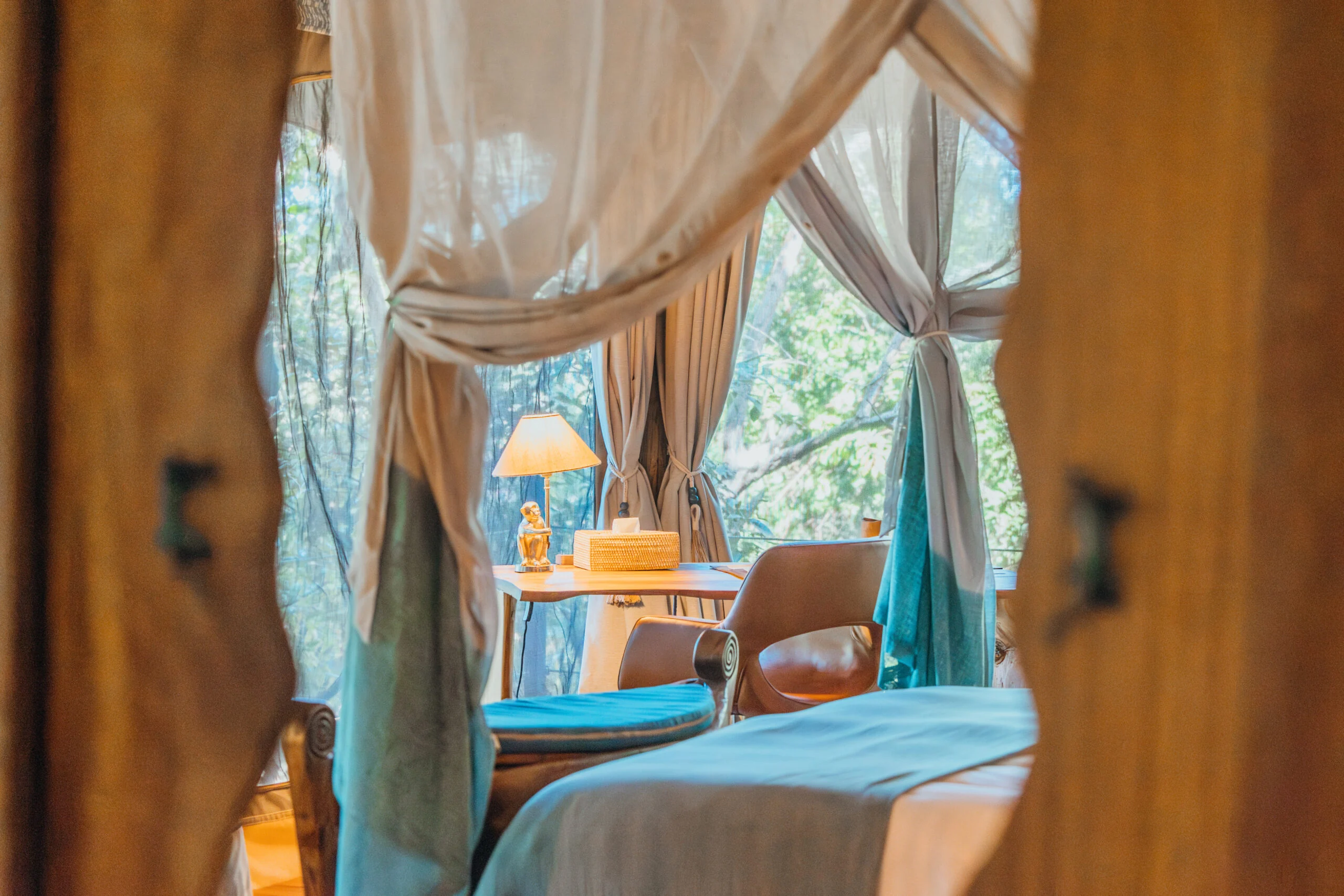 A writing desk by a tent window
