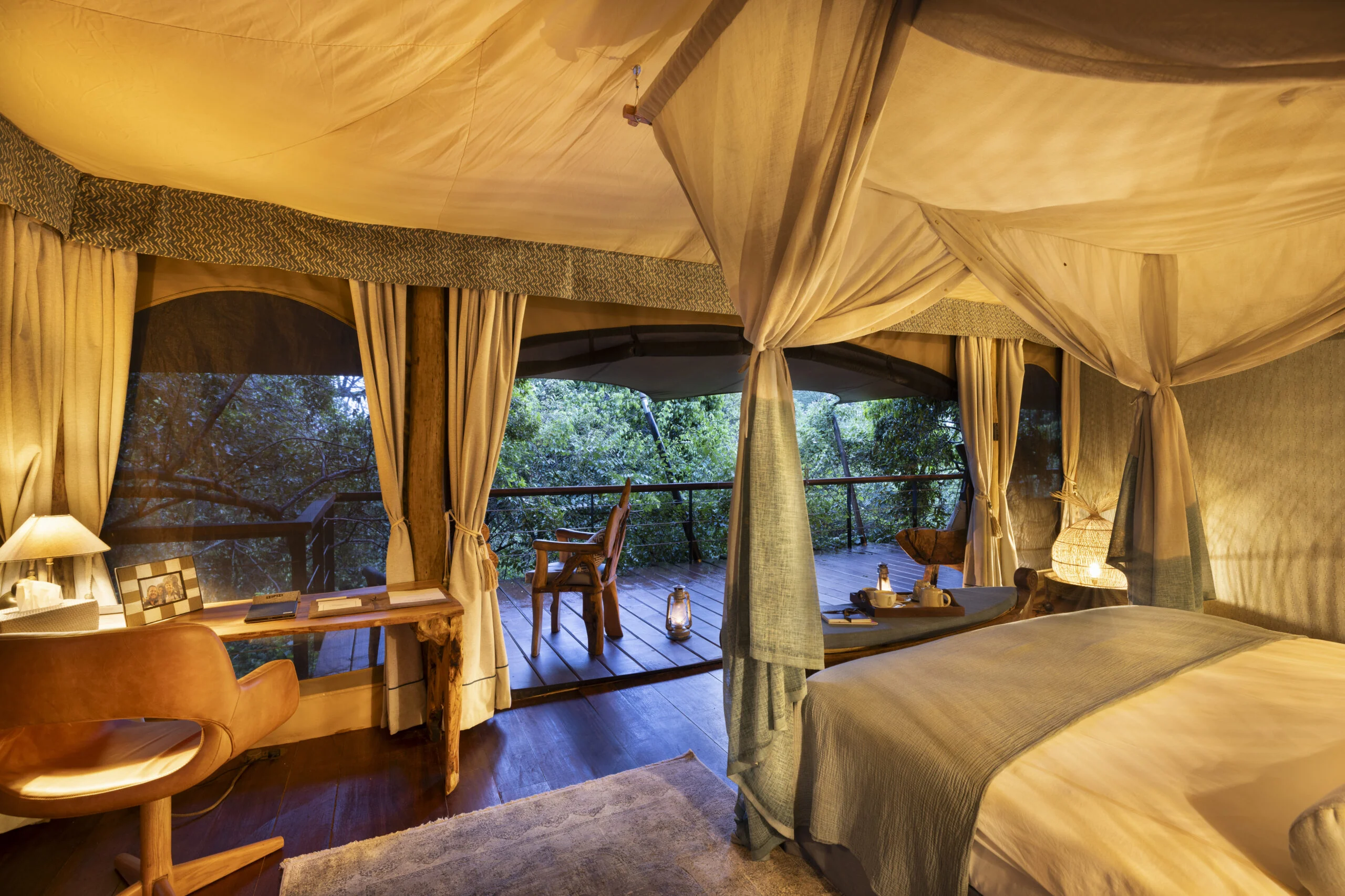 A tent interior with a daybed