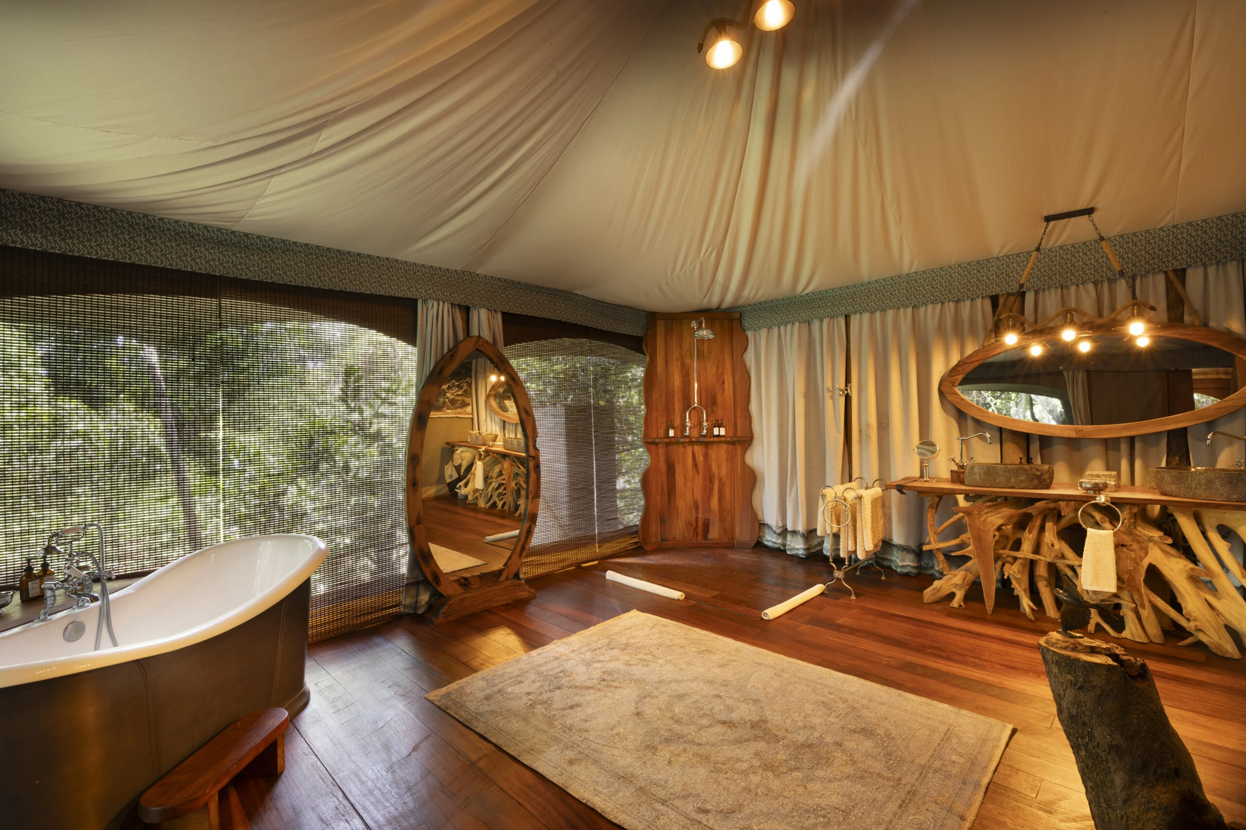 A tent bathroom with a bath