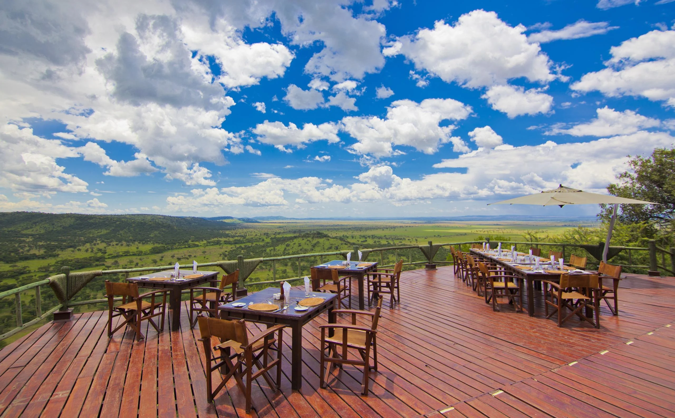 Tables on the deck above the plains