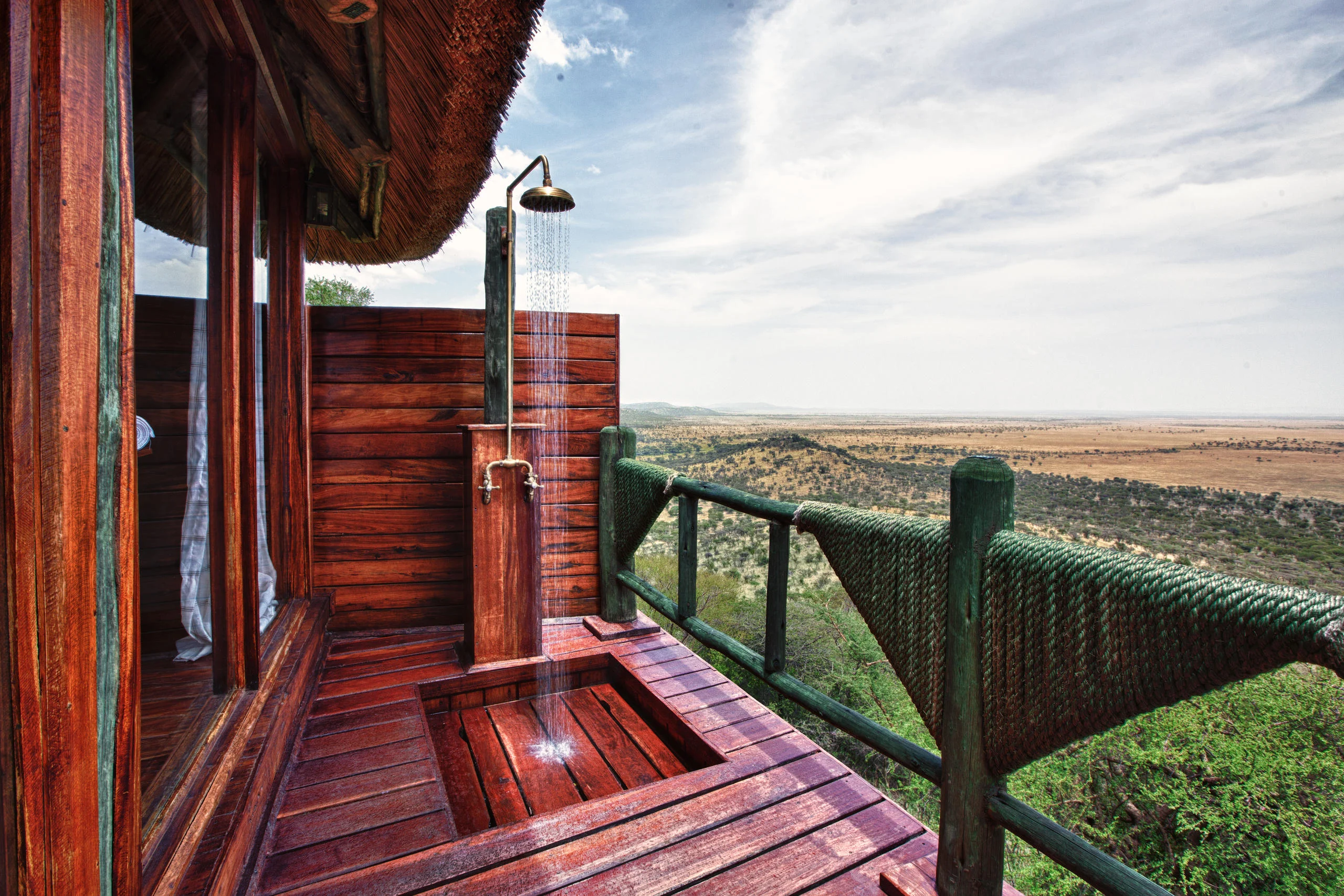 An outdoor shower on a timber deck