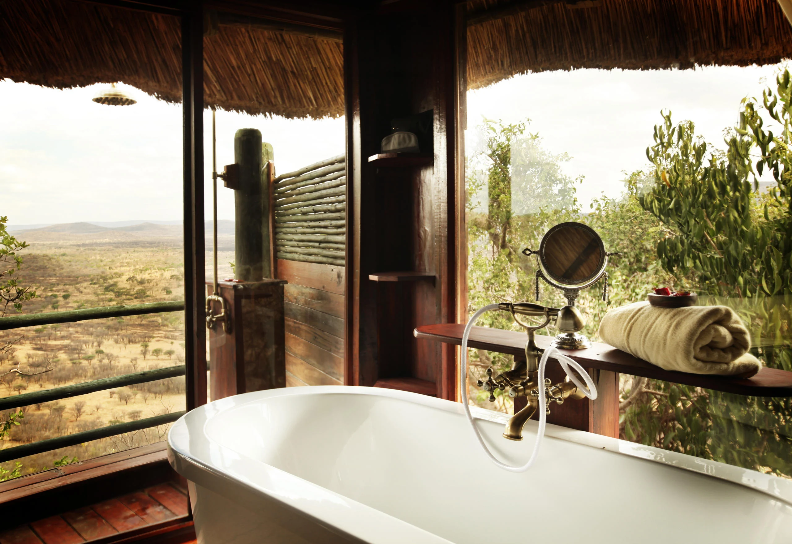 A bath beside a window onto the plains