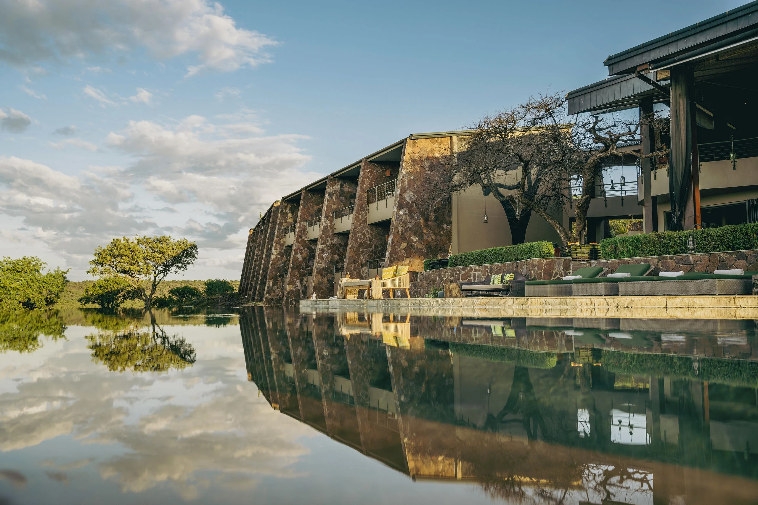 The lodge reflected in the pool