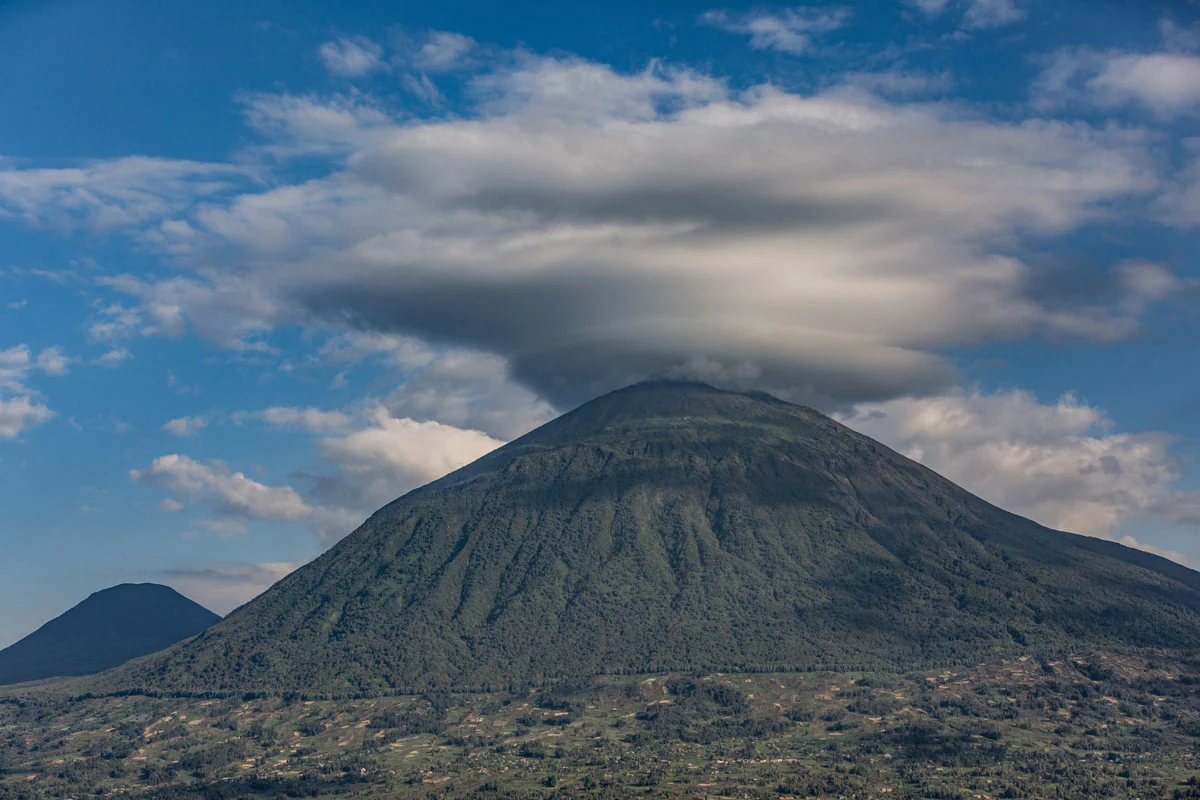 A cloud over the peak of Mount Gahinga
