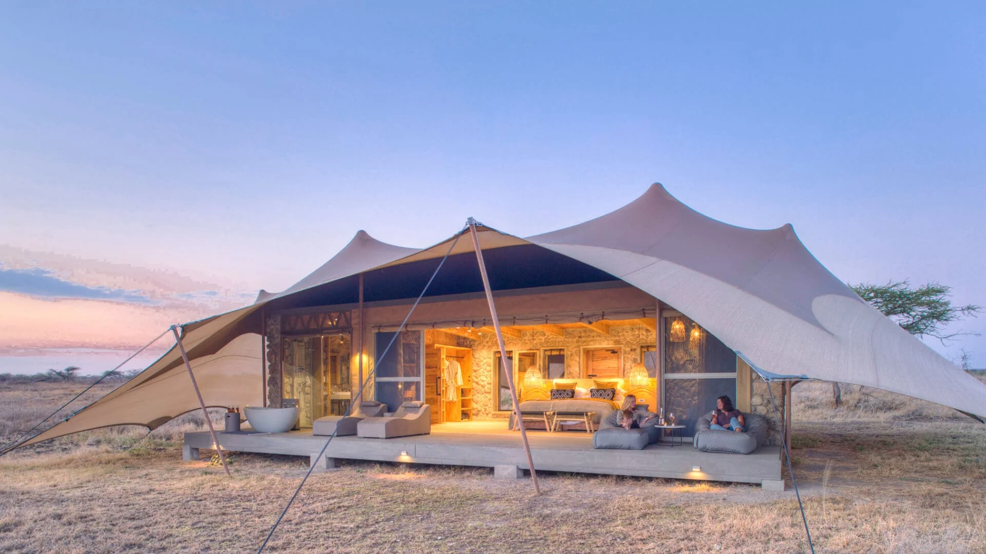 A guest tent on the plains at dusk