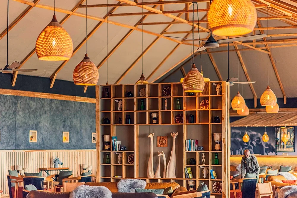 The lounge with woven pendant lamps and shelves