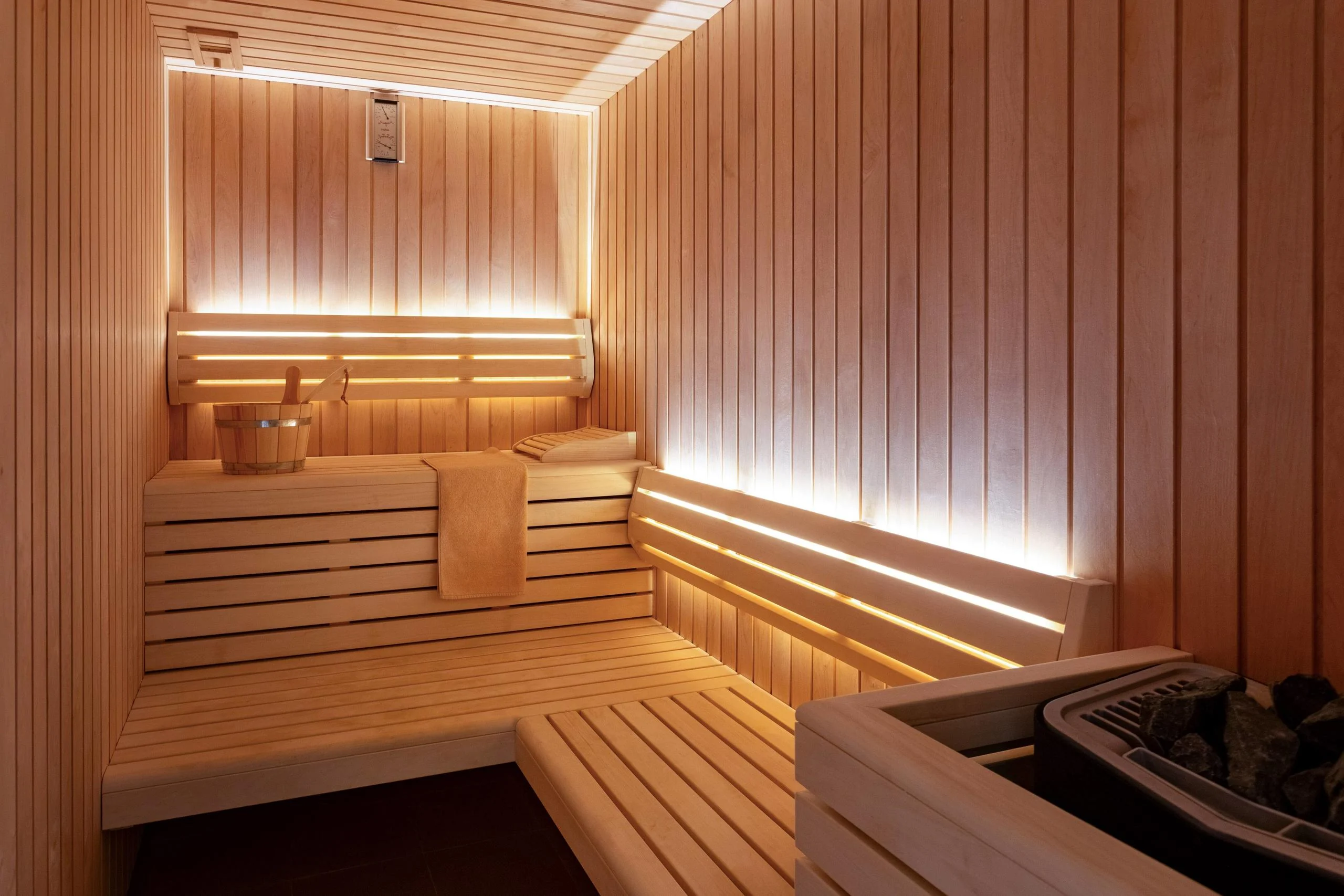 The sauna with timber benches
