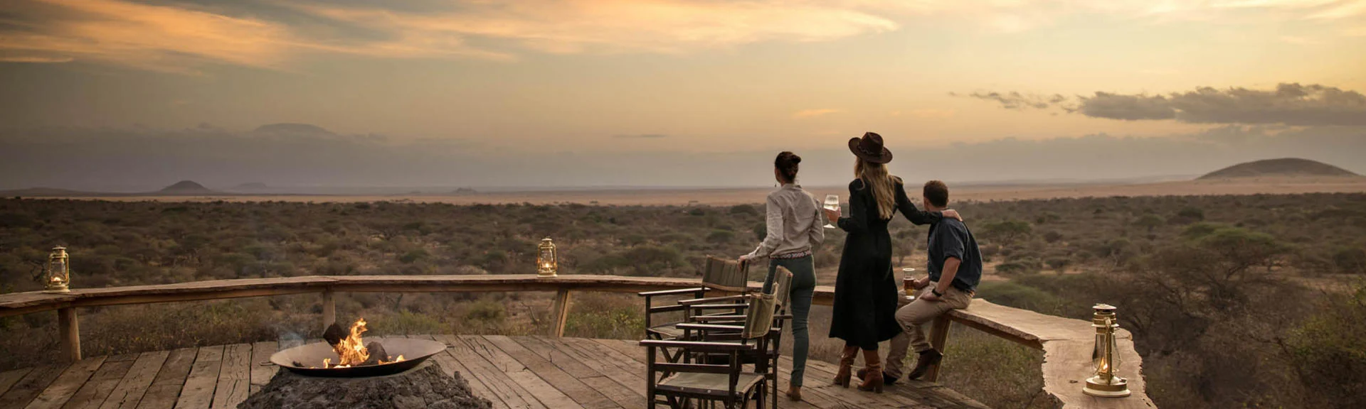 Guests on the deck at sunset