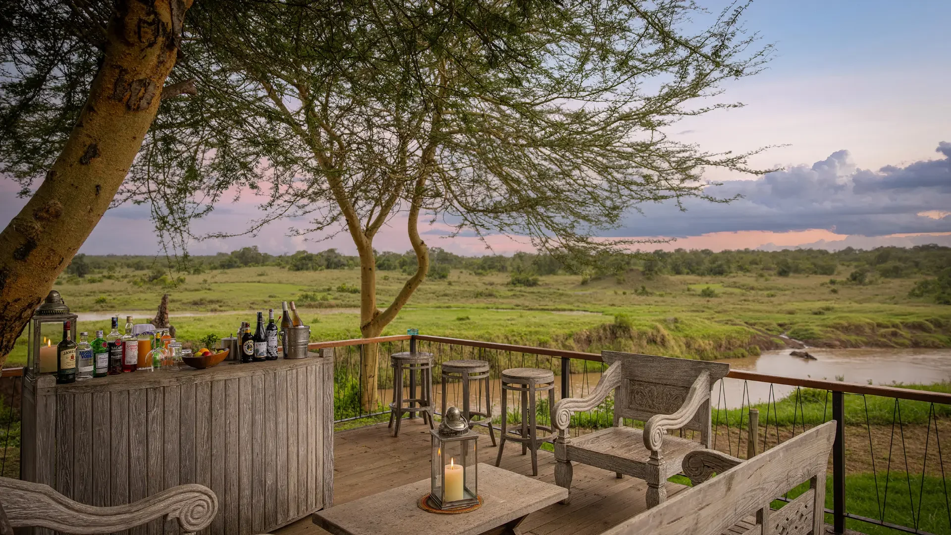 A drinks table on the deck above the river