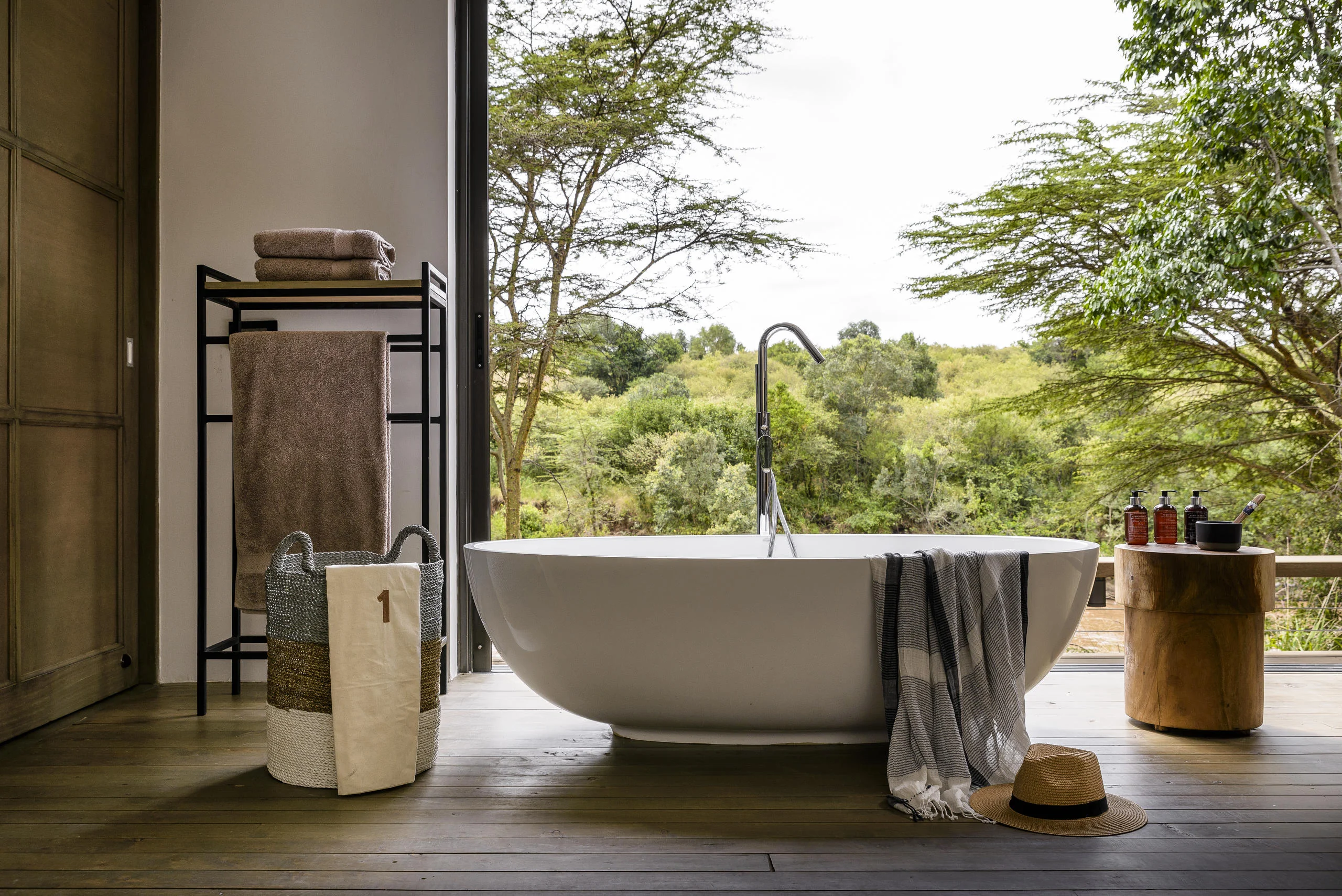 A bath on a deck above the river