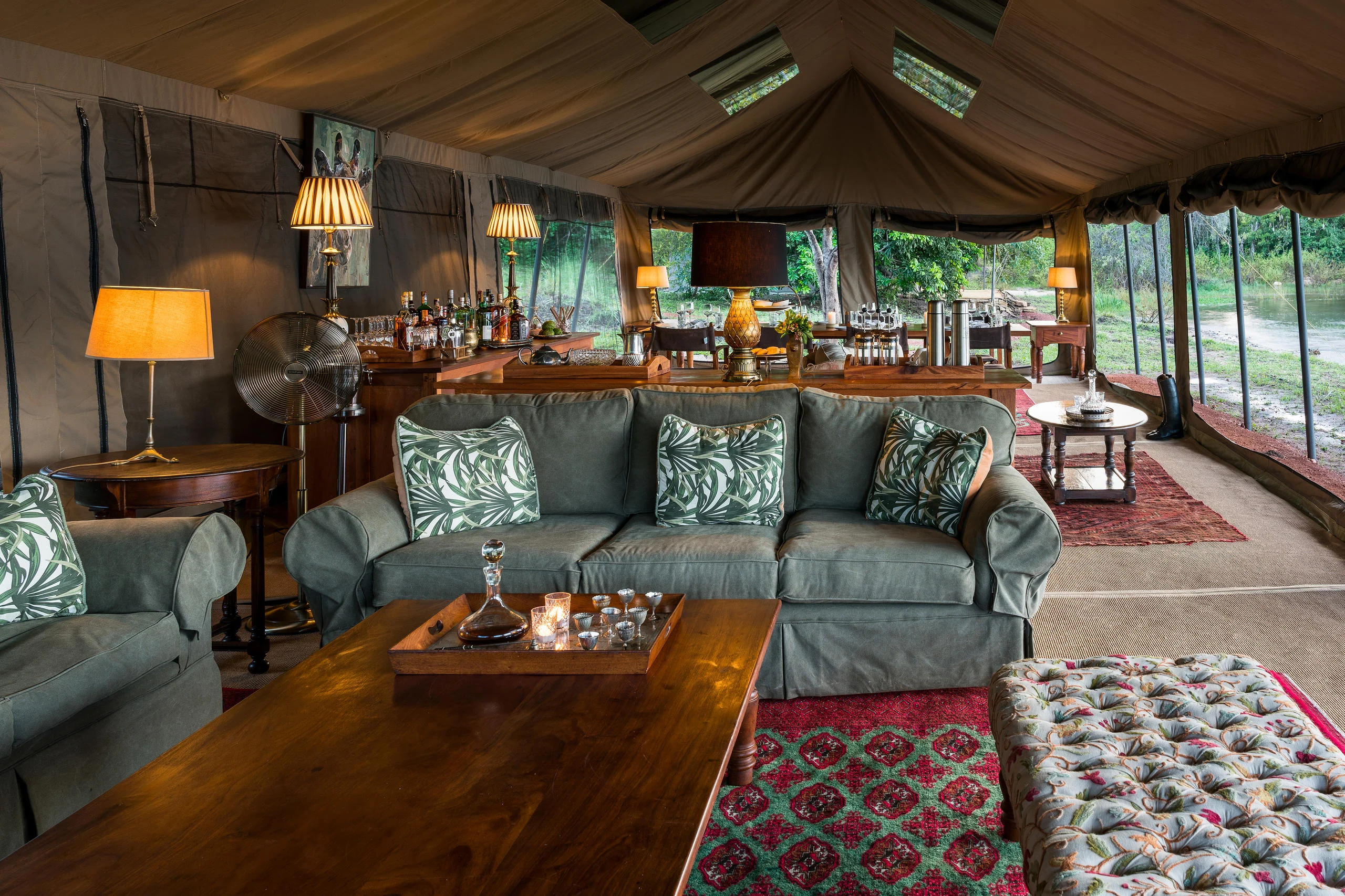 The lounge tent with sofas and lamps