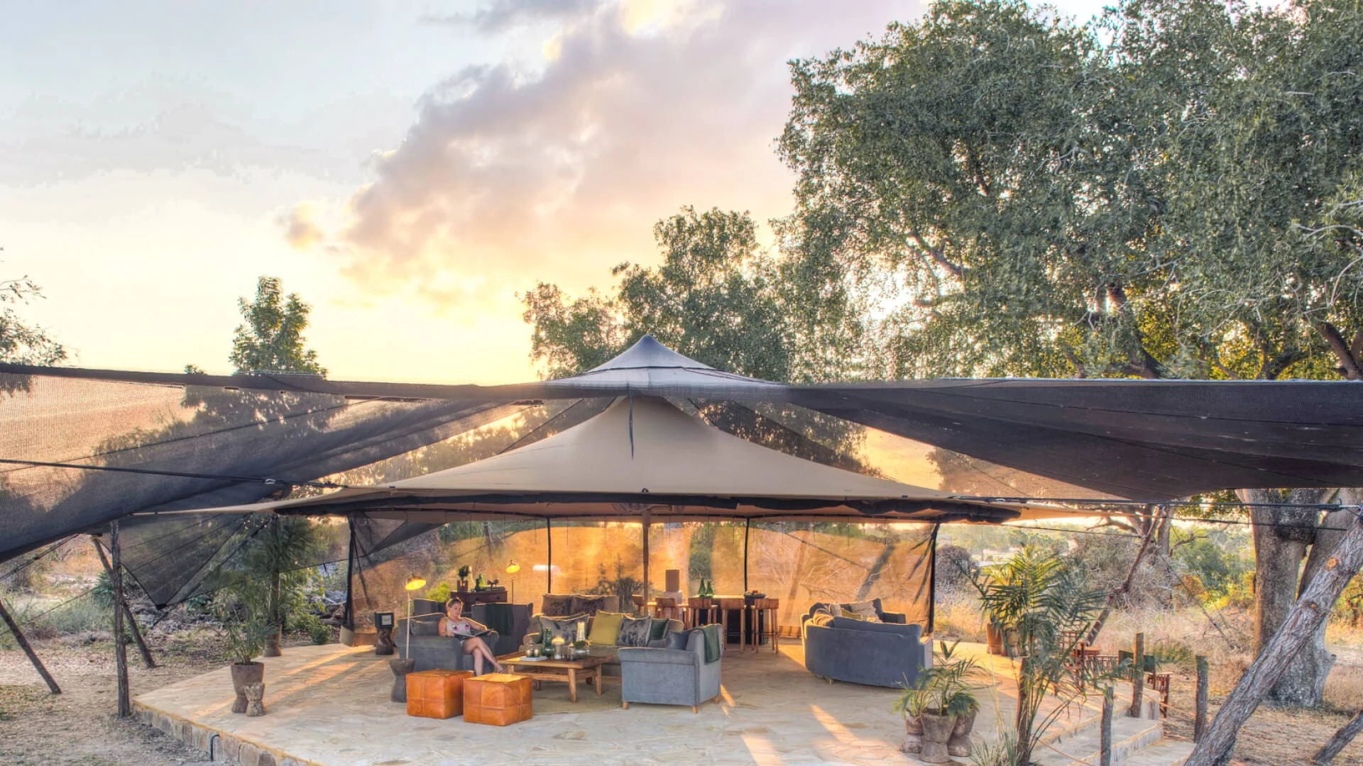 The main tent at dusk with the lake beyond