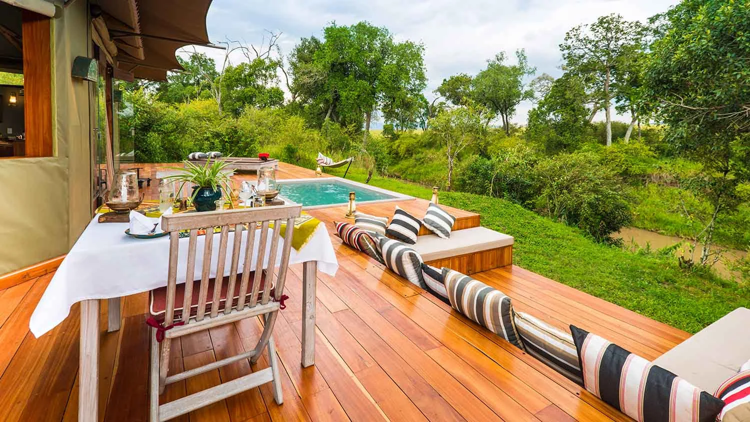 A room deck with its plunge pool above the trees