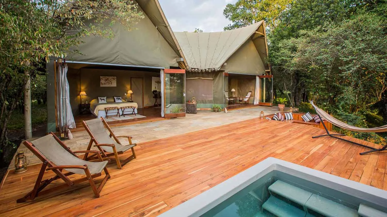 A double tent and its deck with a plunge pool