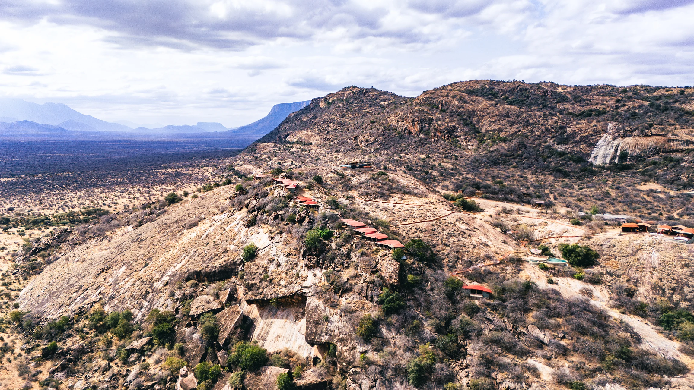 The lodge on its rocky ridge, from the air