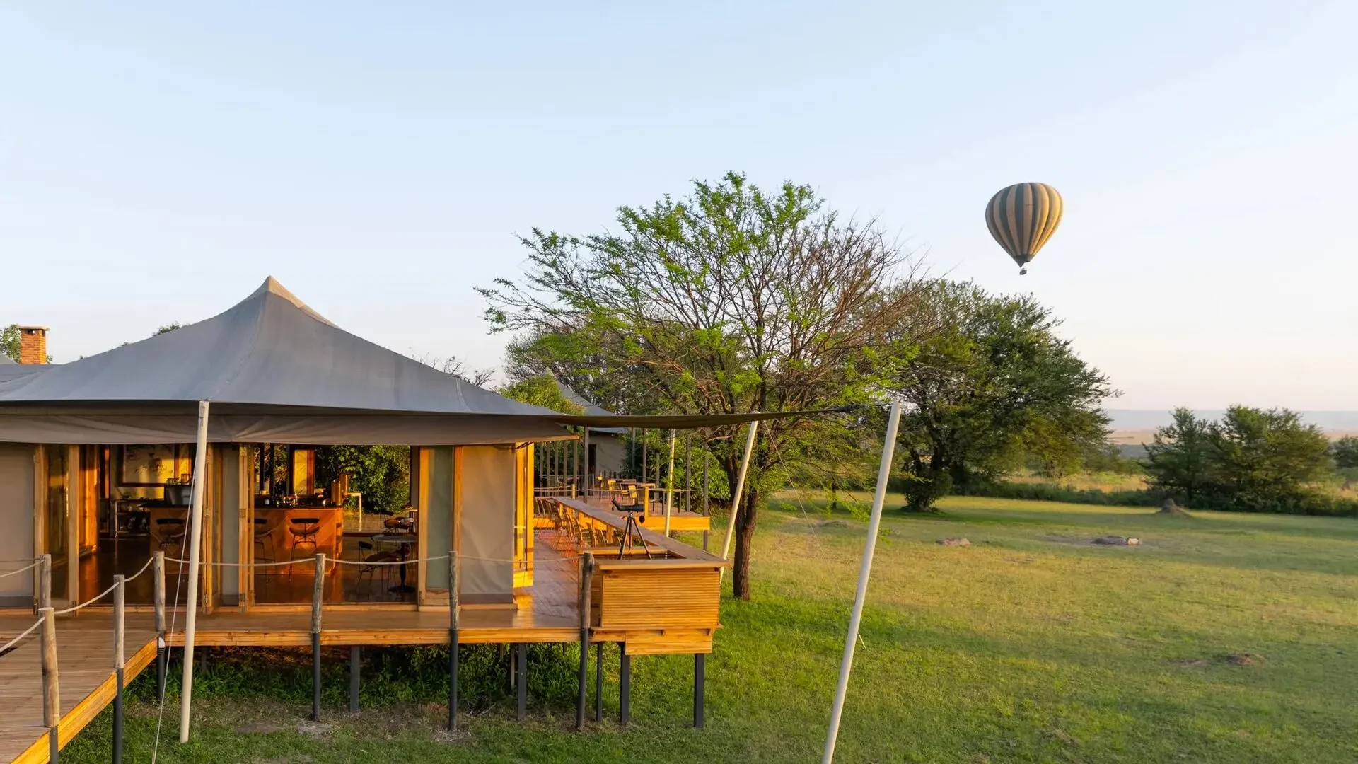 A guest tent with a balloon in the sky beyond