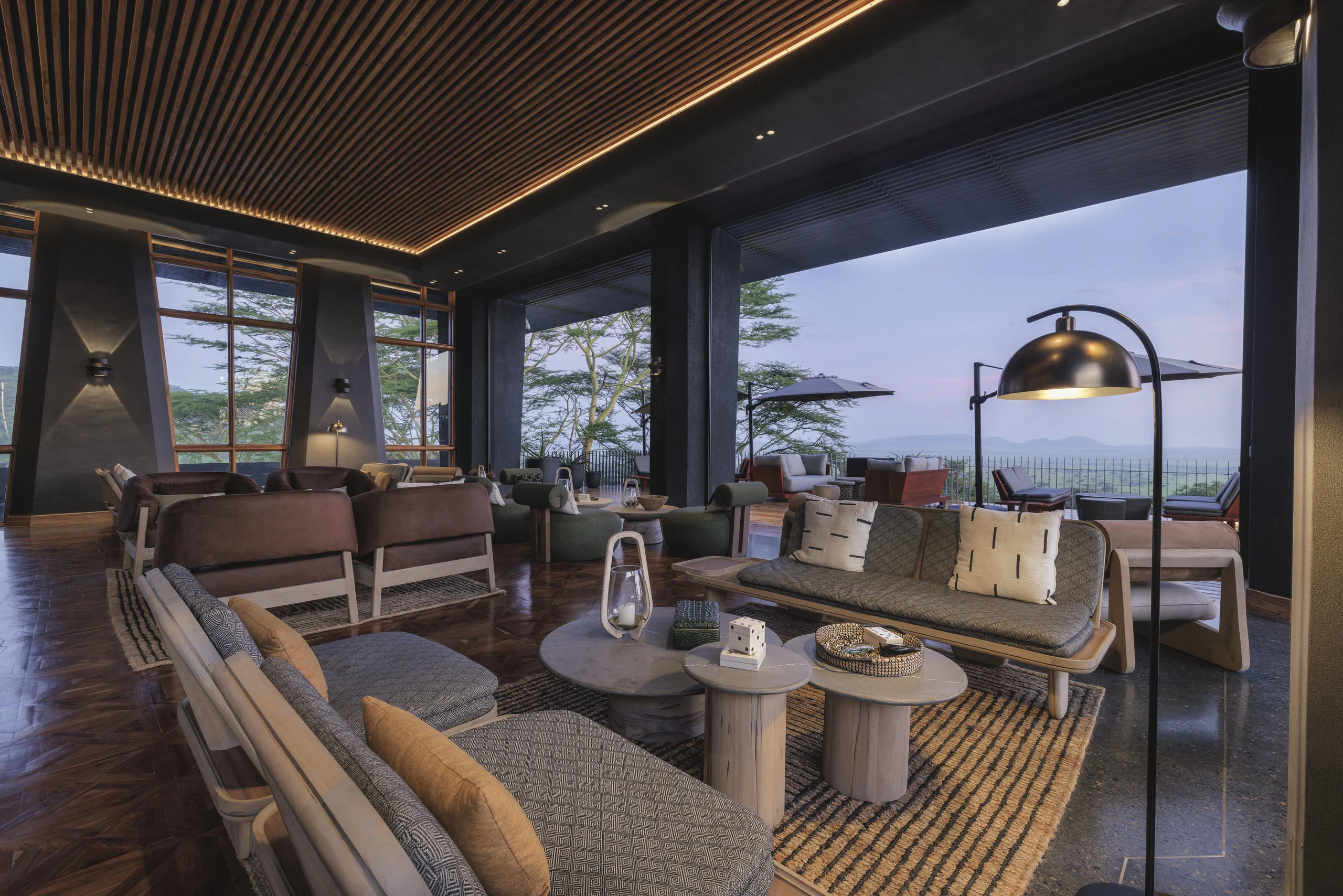 A lounge with lanterns and a view over the plains