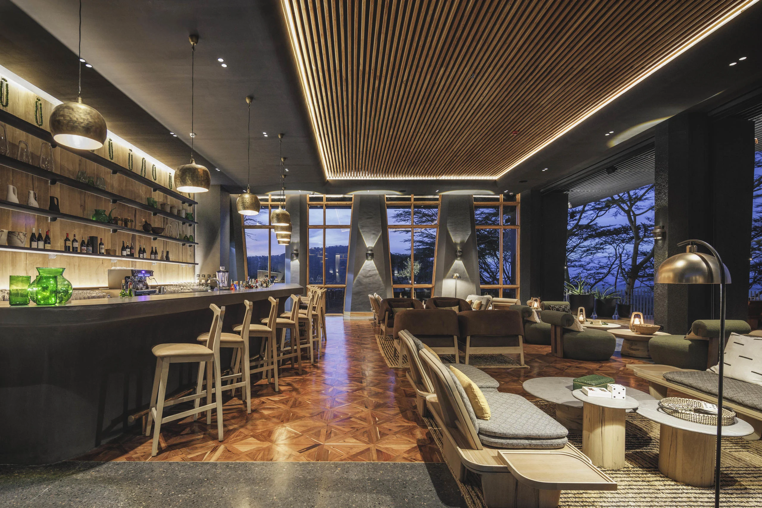 The bar with stools and a timber ceiling