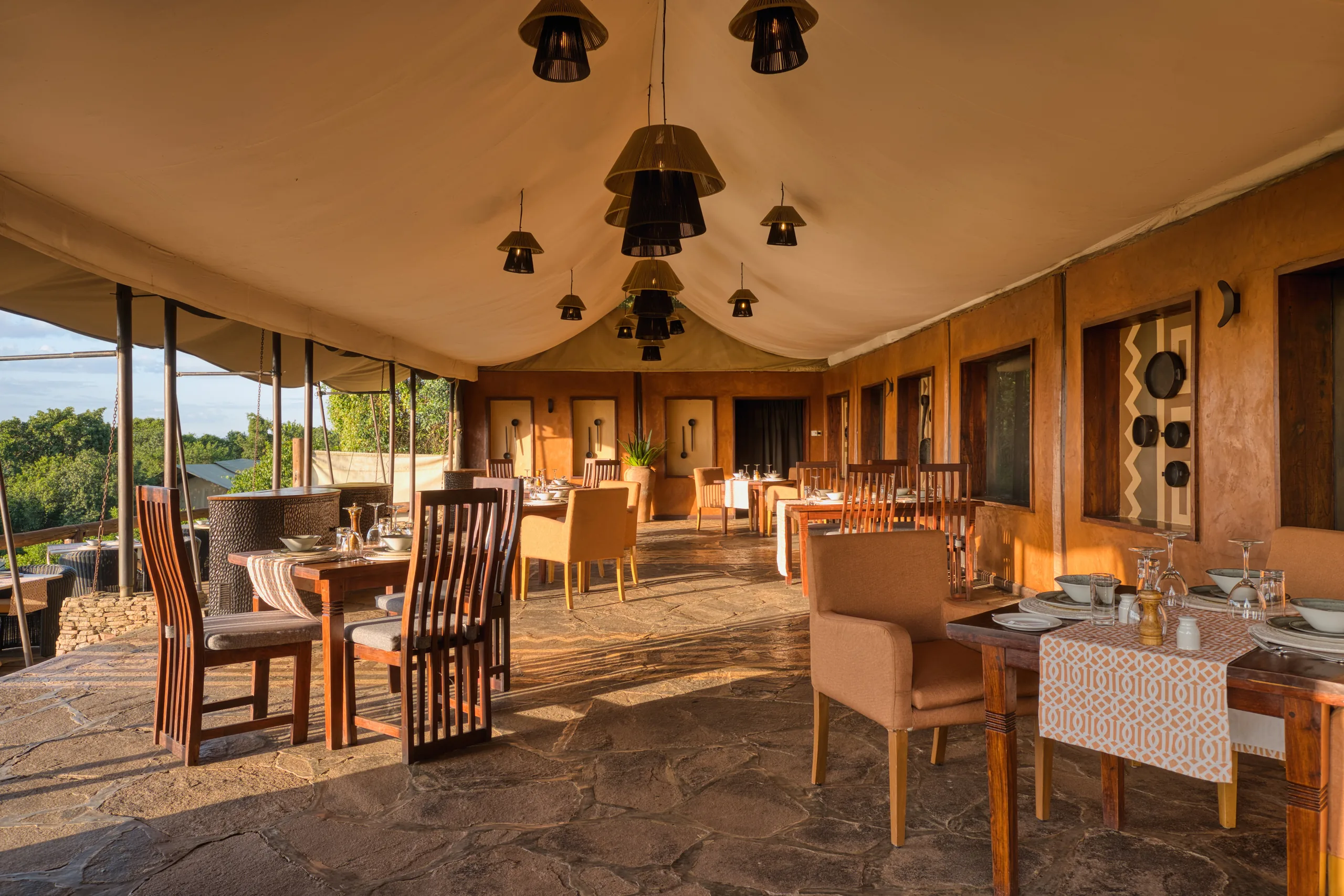 The dining tent with views of the surrounding landscape at Serengeti Migration Camp