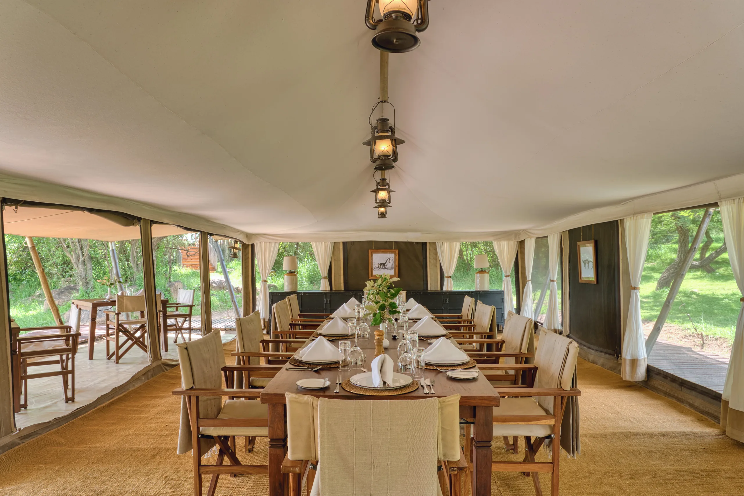The long dining table inside the dining tent at Serengeti Pioneer Camp