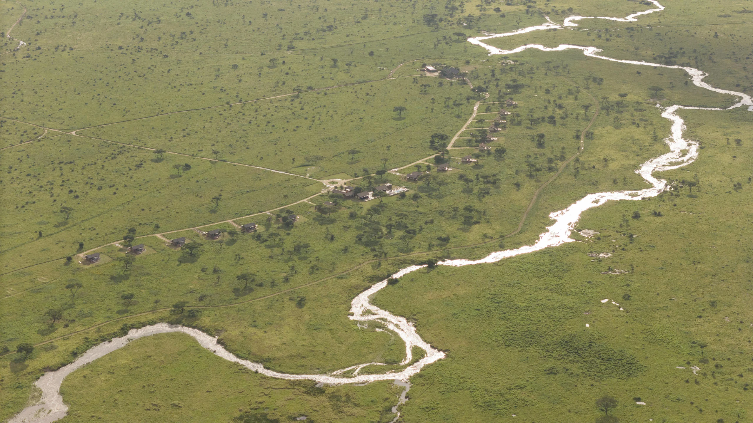 A river winding across the plains, from the air