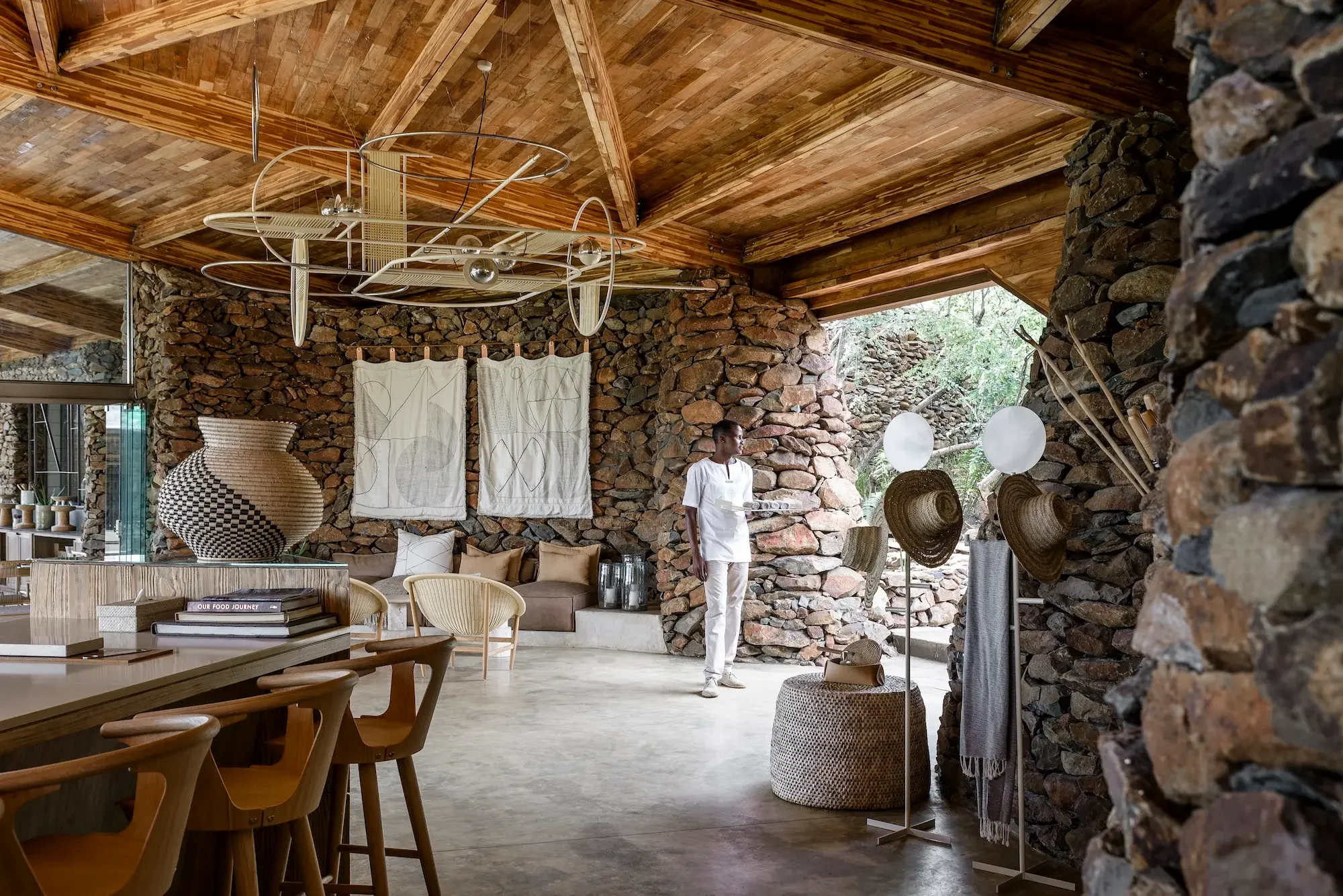 The dining area with stone walls and timber beams