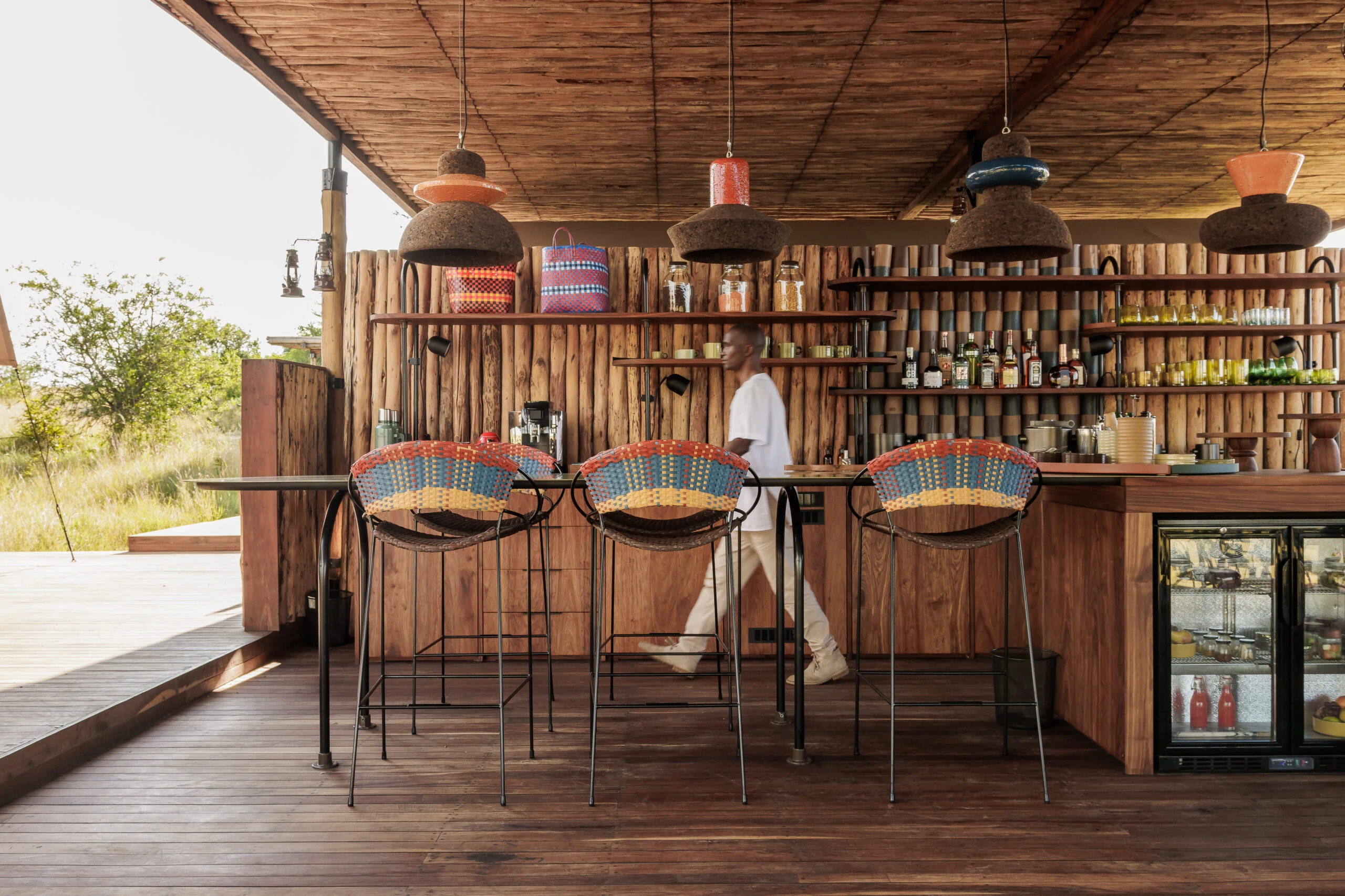 The bar with stools and pendant lamps