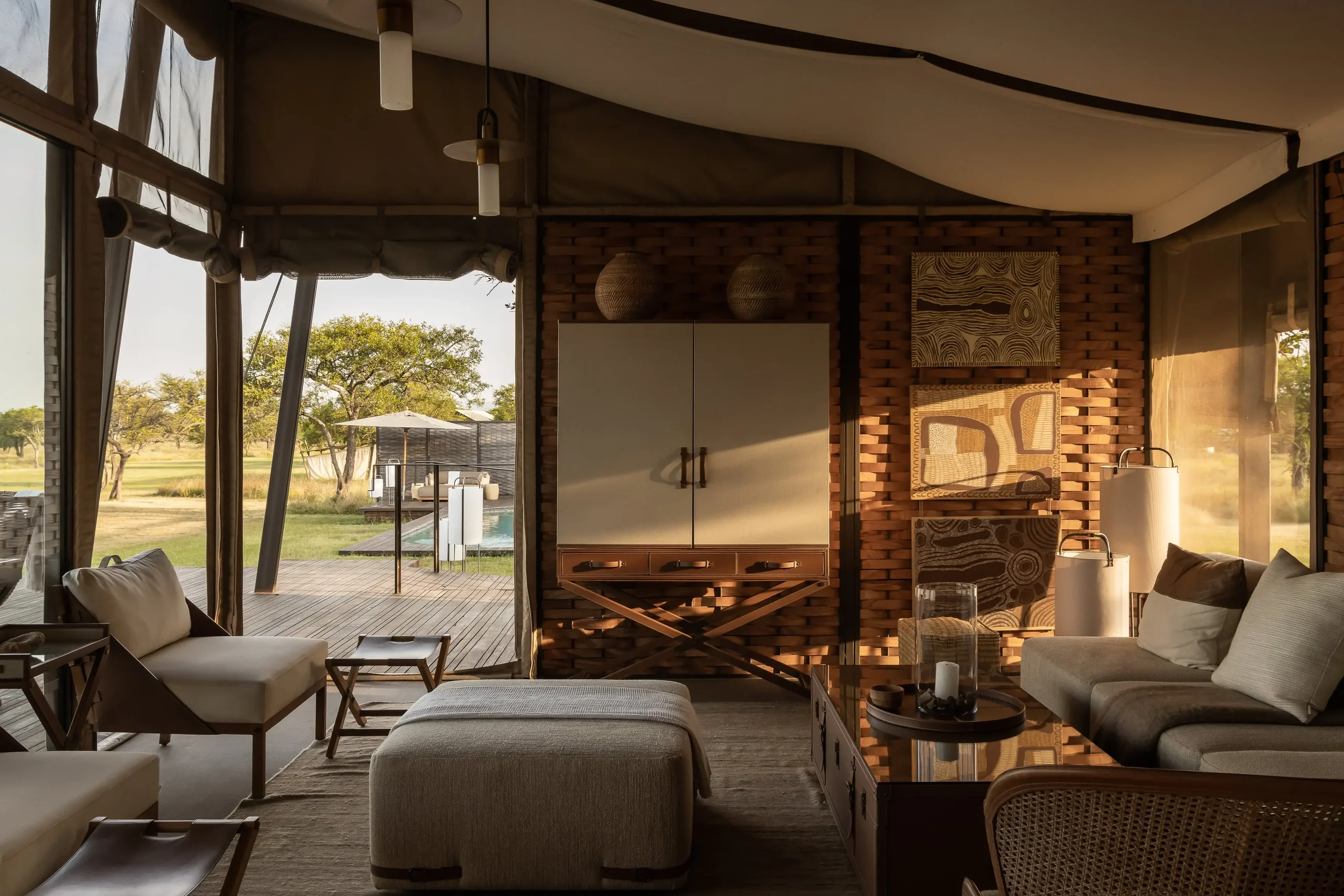 The lounge of a tent, open to the plains