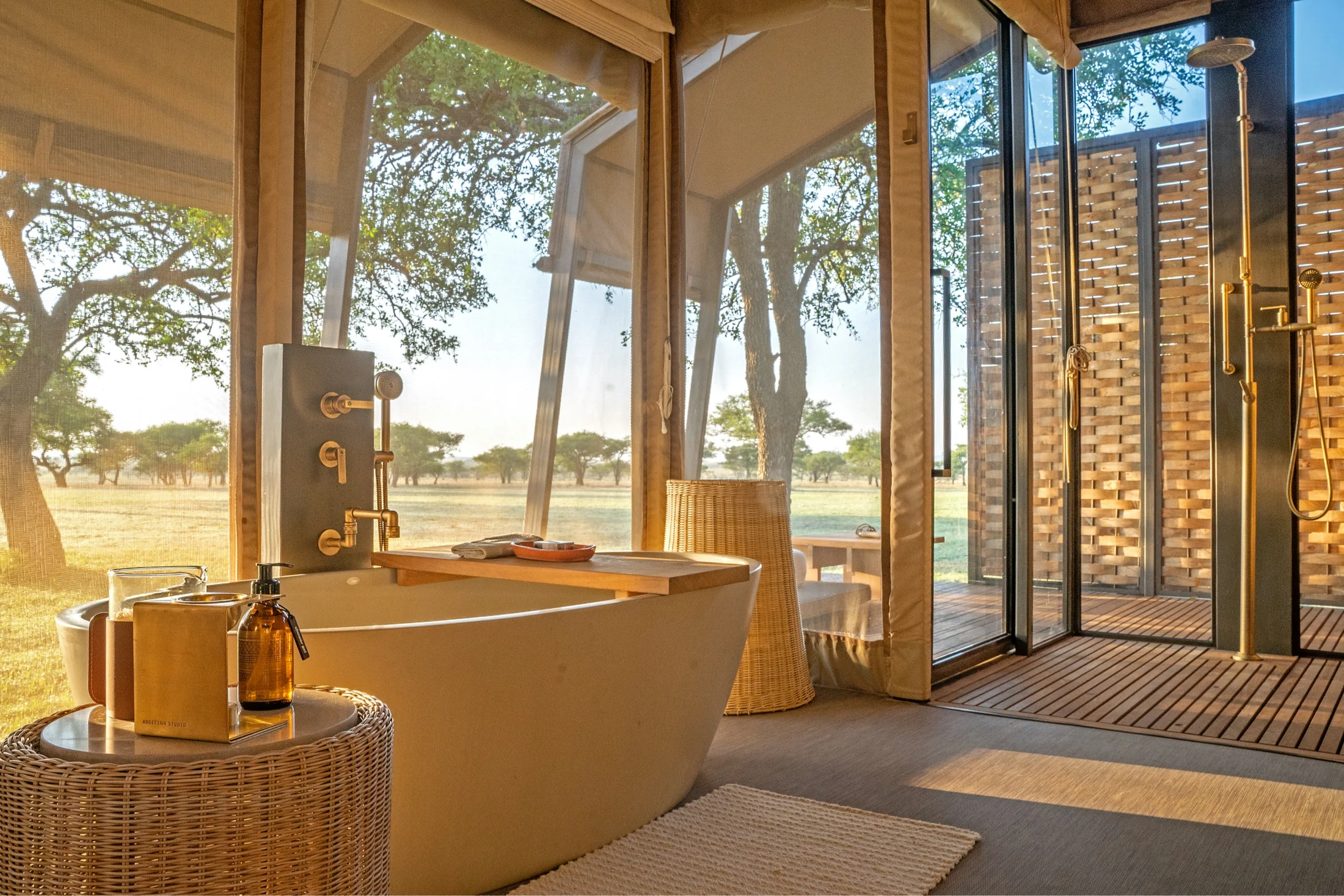 A bath with the plains beyond the glass