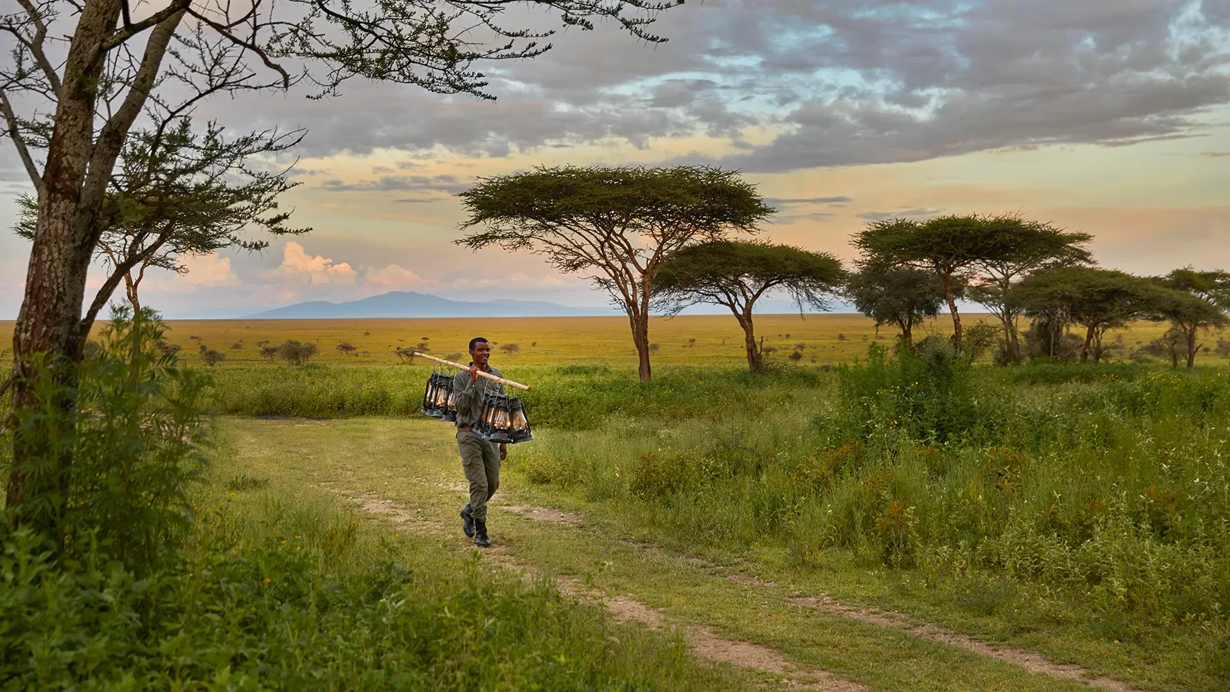 A member of staff walking out to the plains