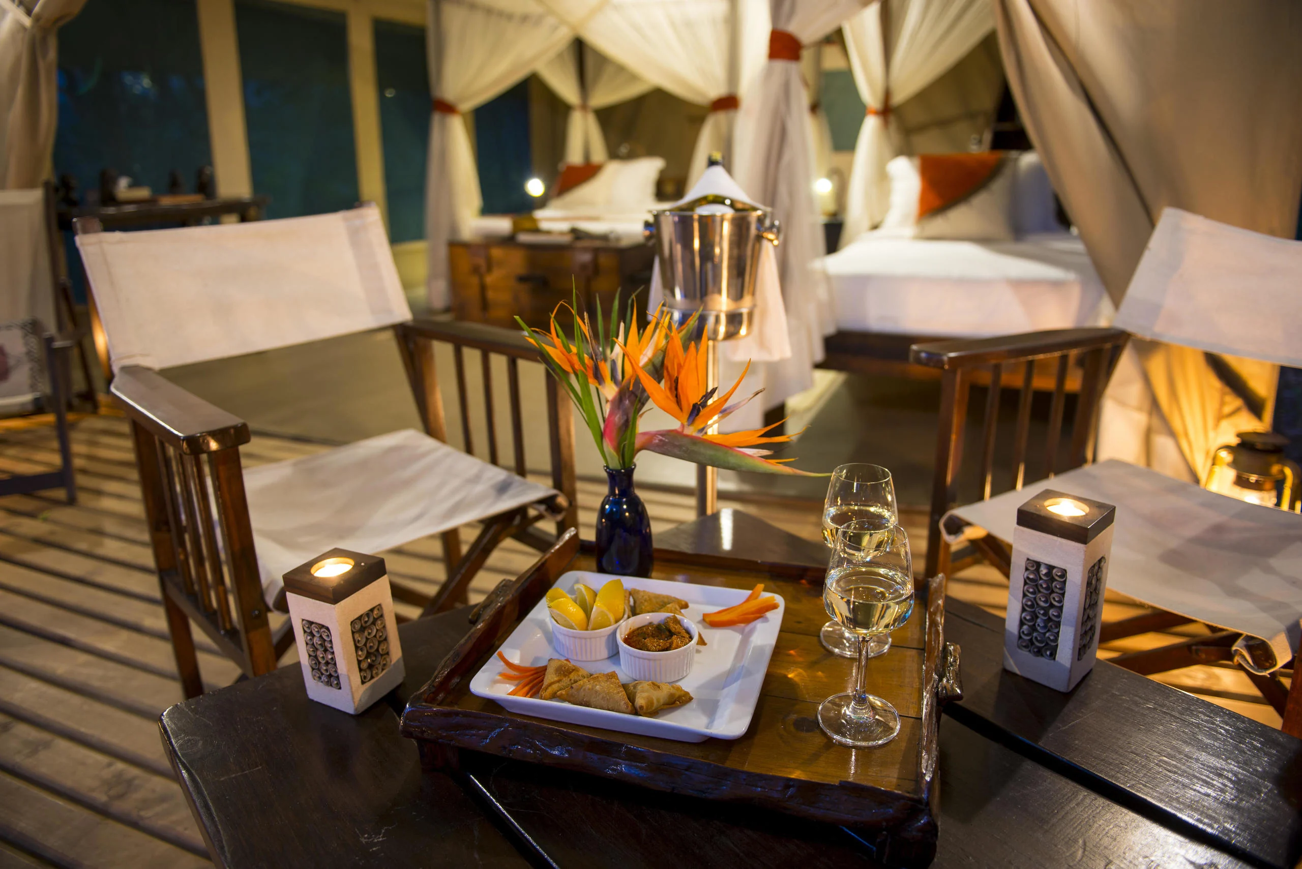 A tray of drinks on a tent deck
