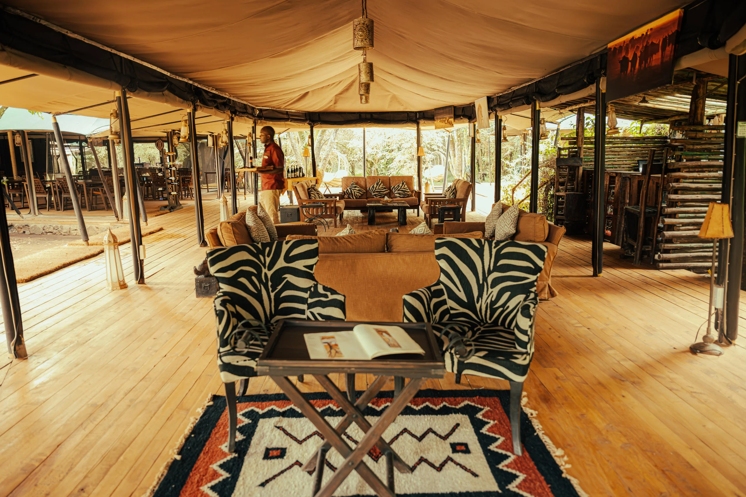 The lounge tent with zebra-print chairs