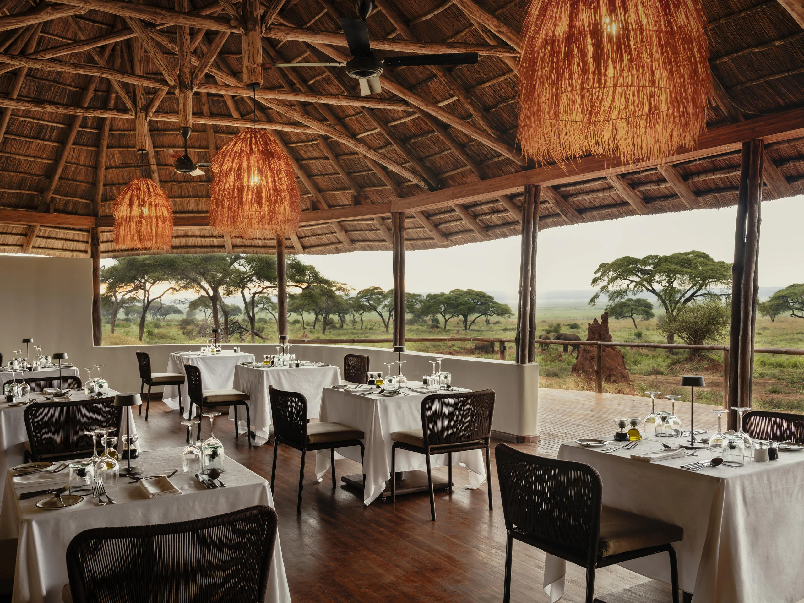 The dining tent with tables laid