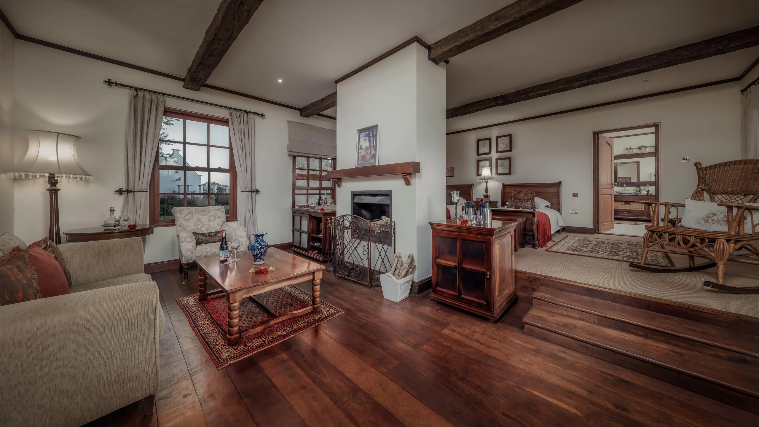 A suite sitting room with a fireplace