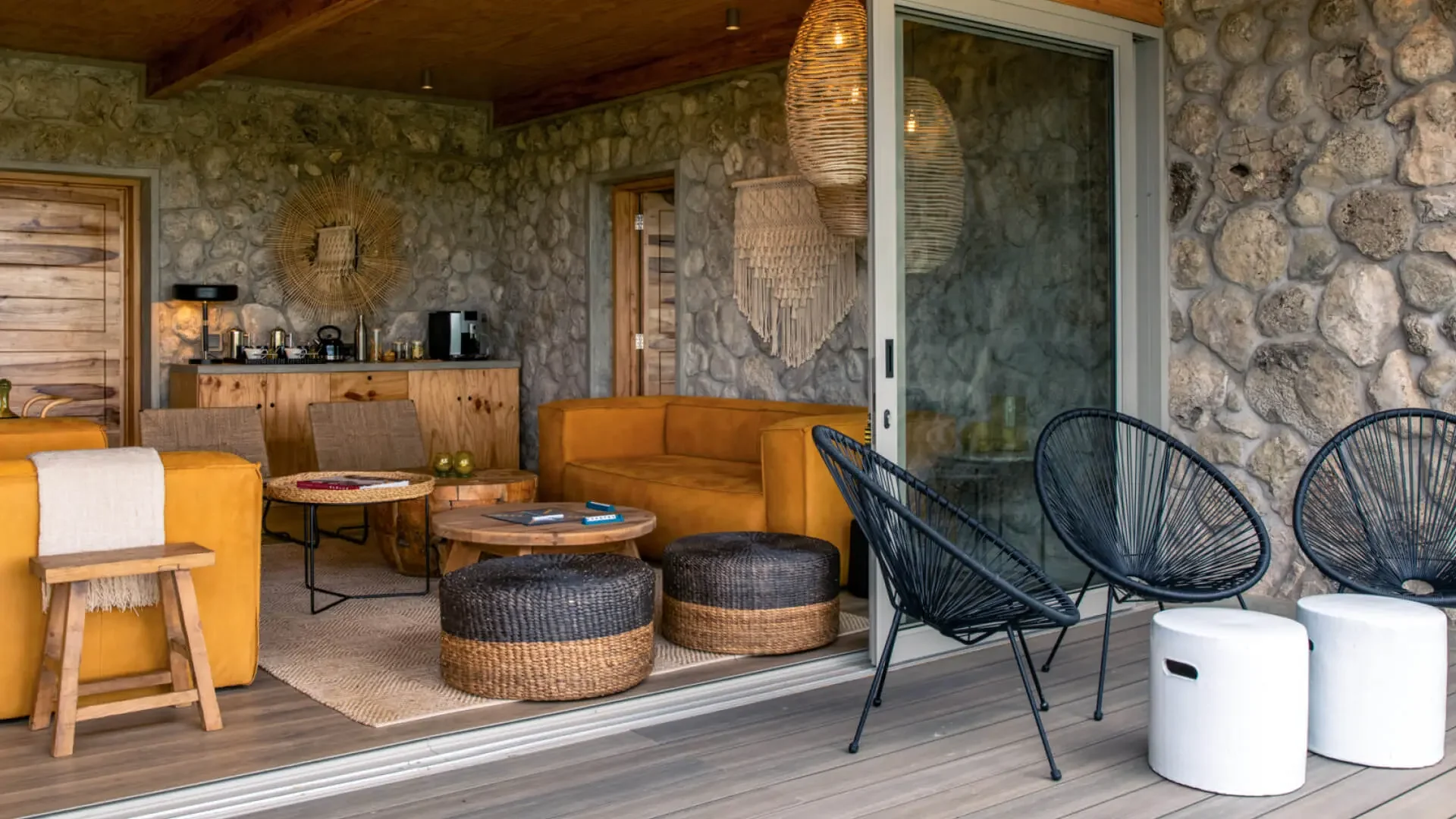 The sitting area opening onto the deck