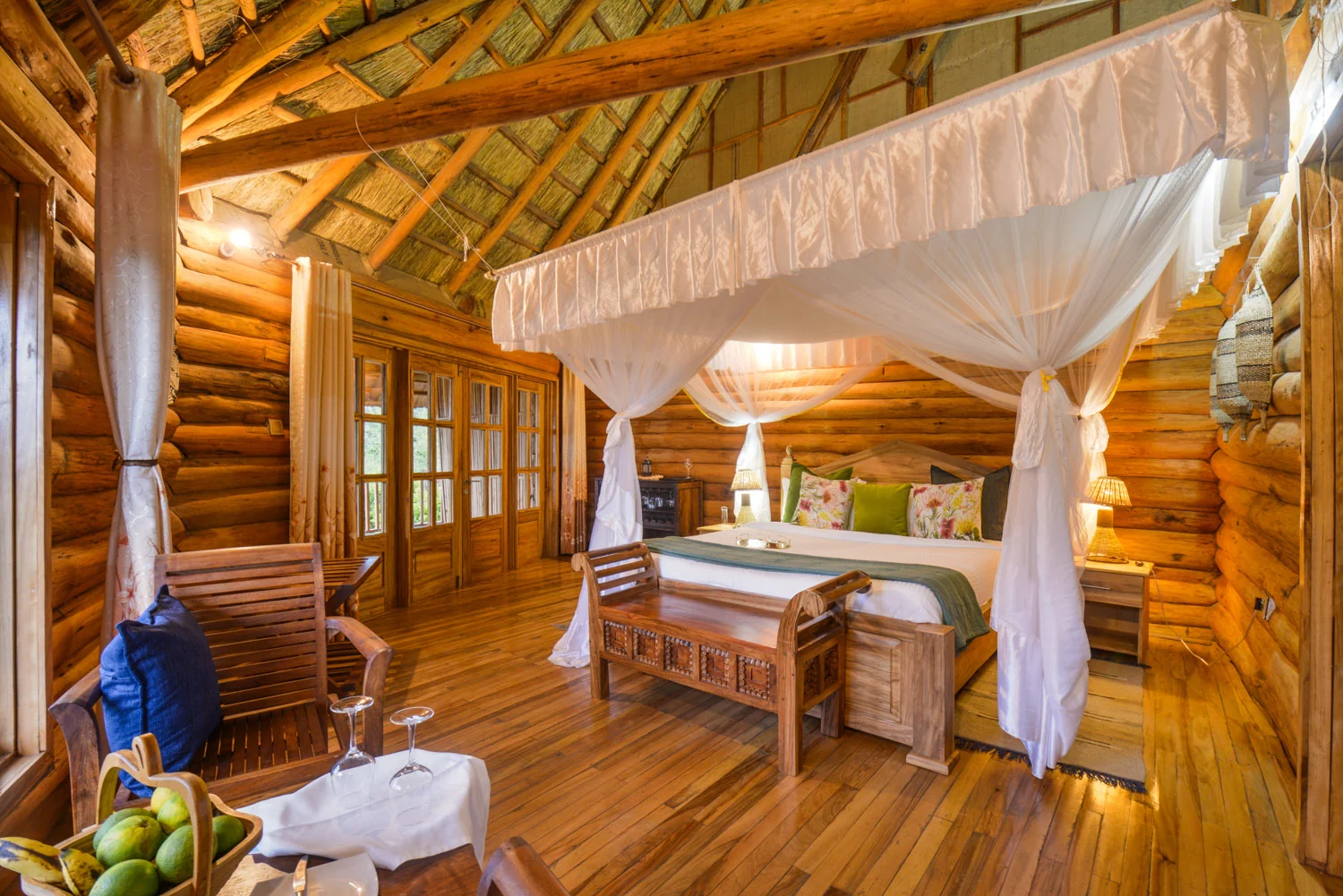 A cottage bedroom with fruit on the table