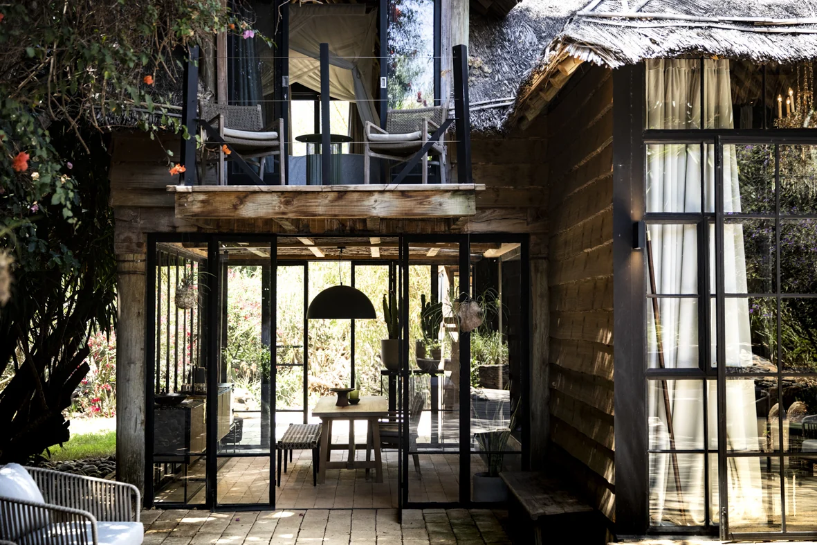 A villa entrance under thatch