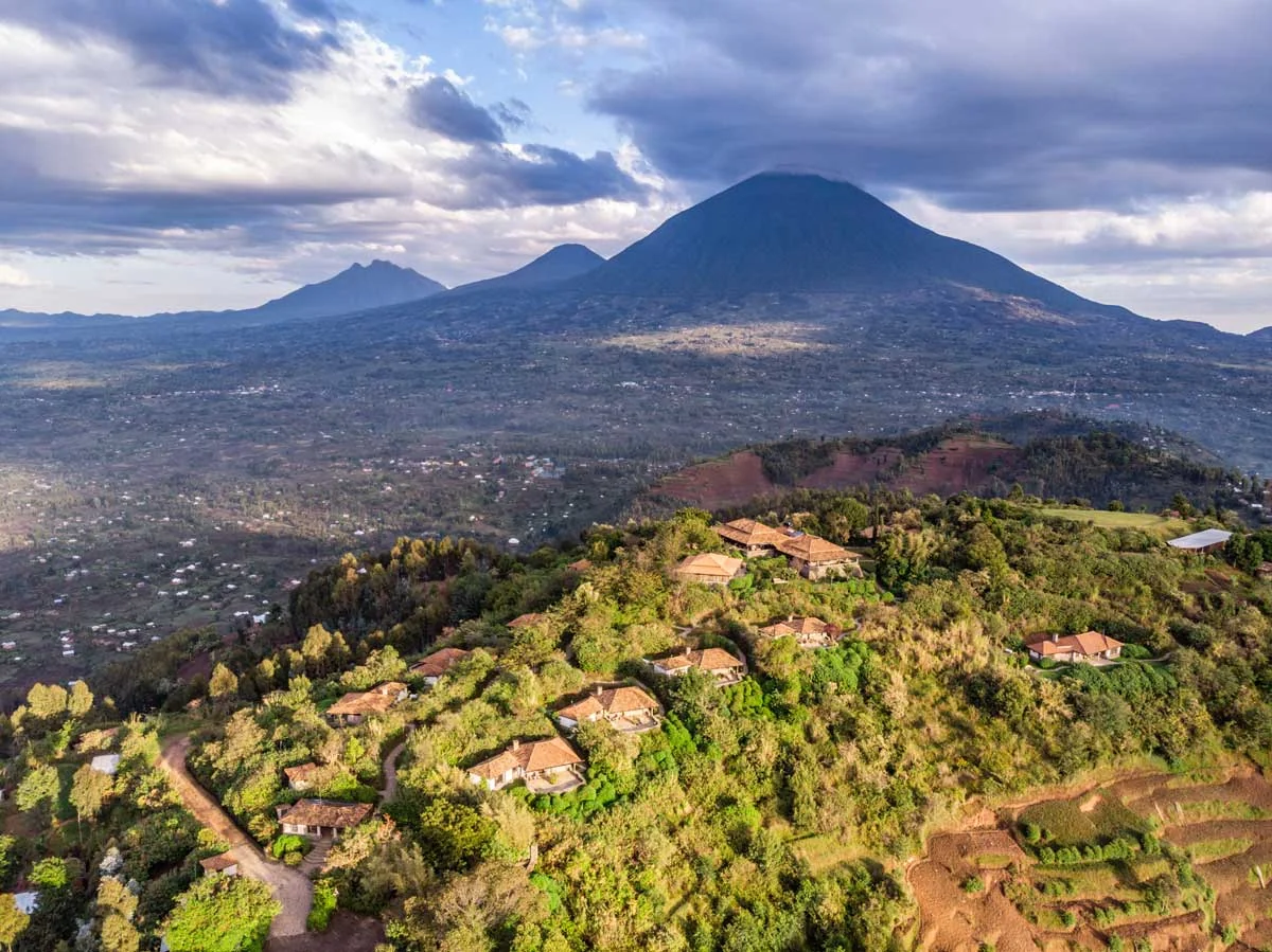 The lodge on the hillside below the volcanoes, from the air