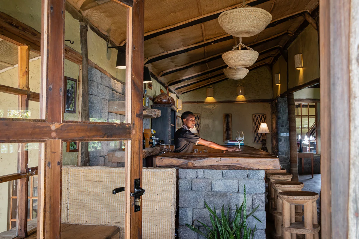 The bar with a member of staff behind the counter