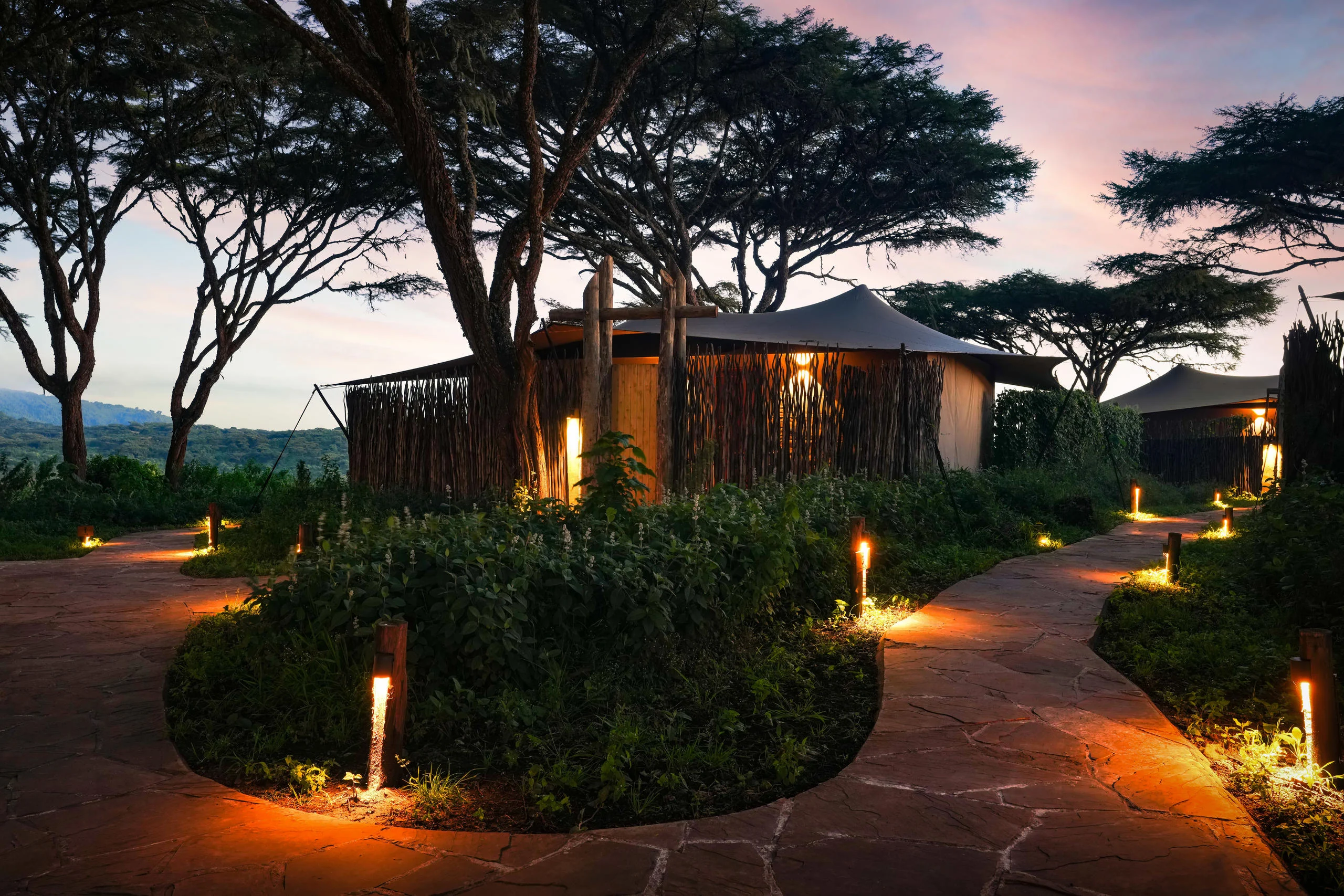 The lit paths between the suites at dusk