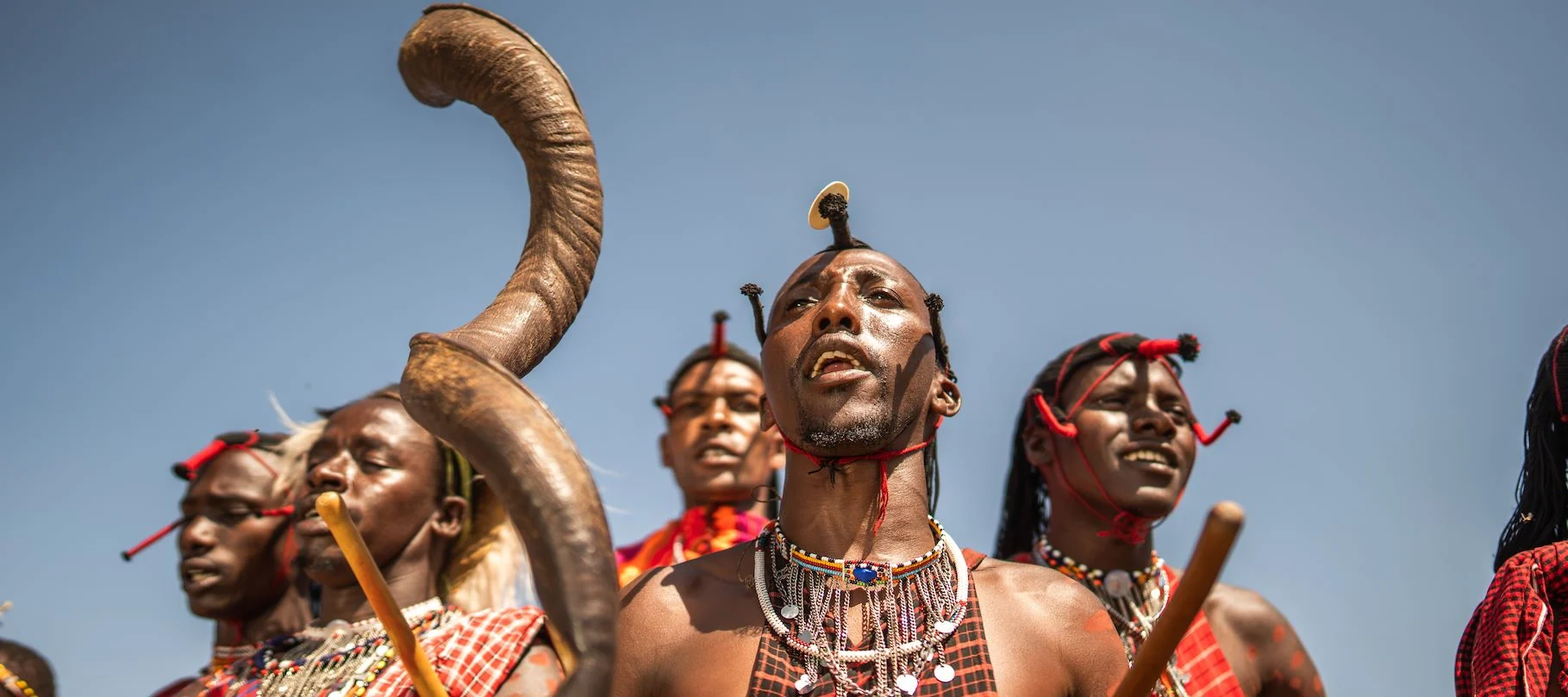 Maasai warriors in headdresses