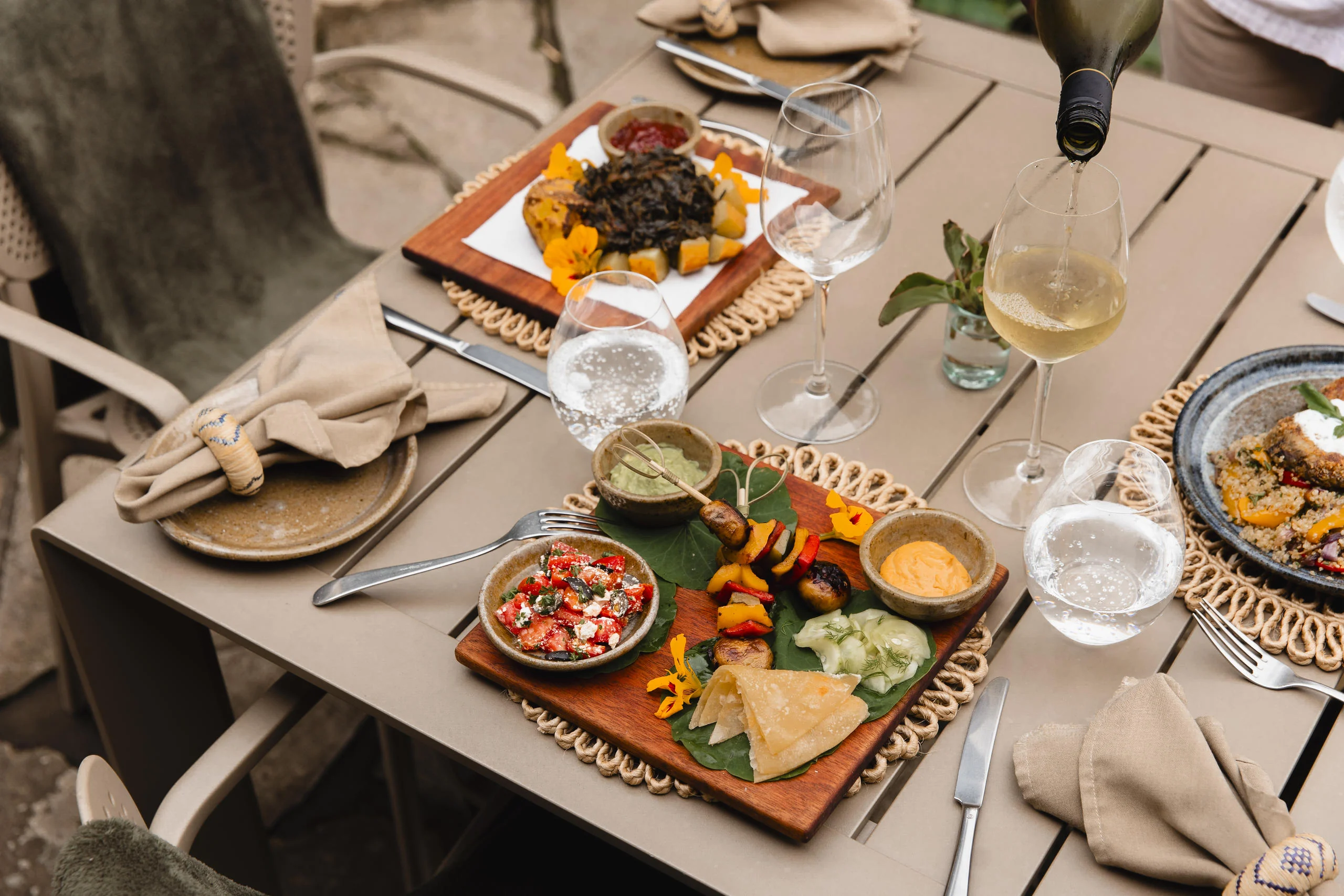Dishes set out on a table on the terrace