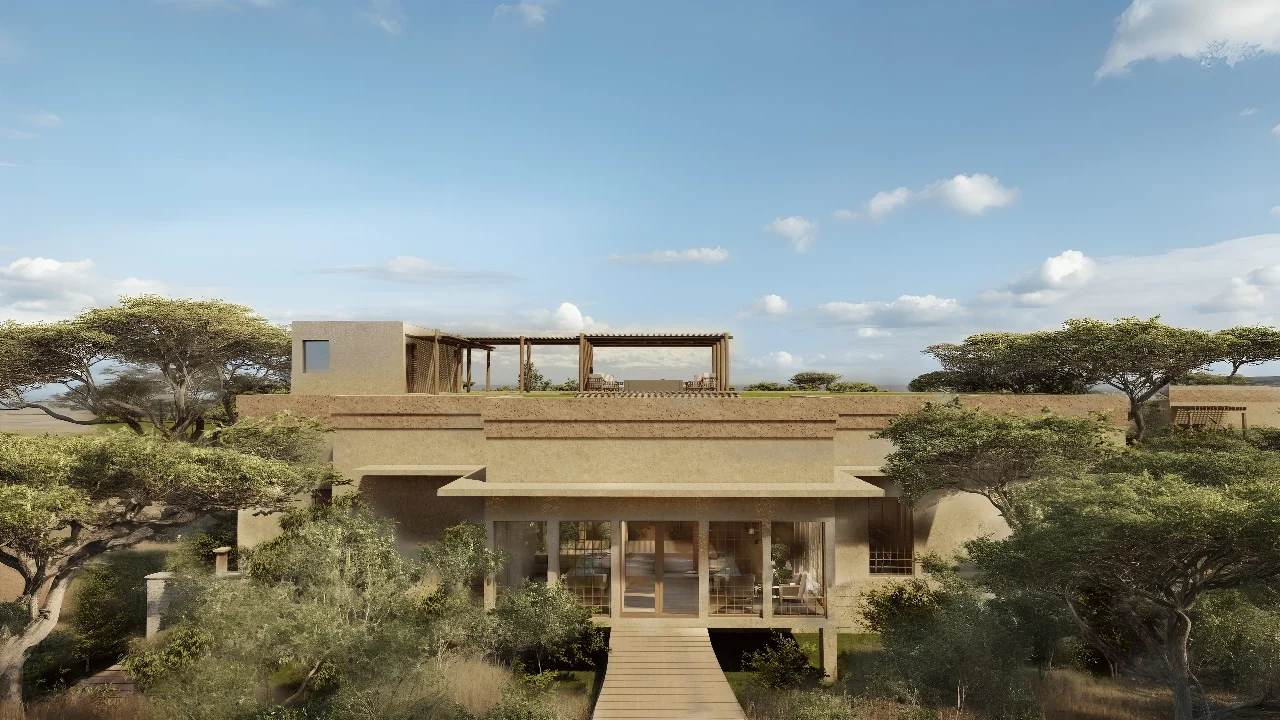The house with its rooftop terrace among the acacias