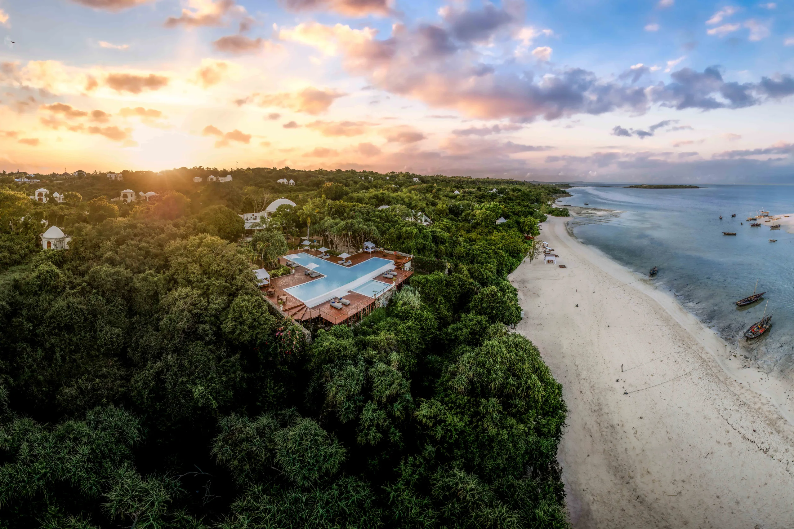 Aerial view of Kilindi Zanzibar, its gardens and beach at sunrise