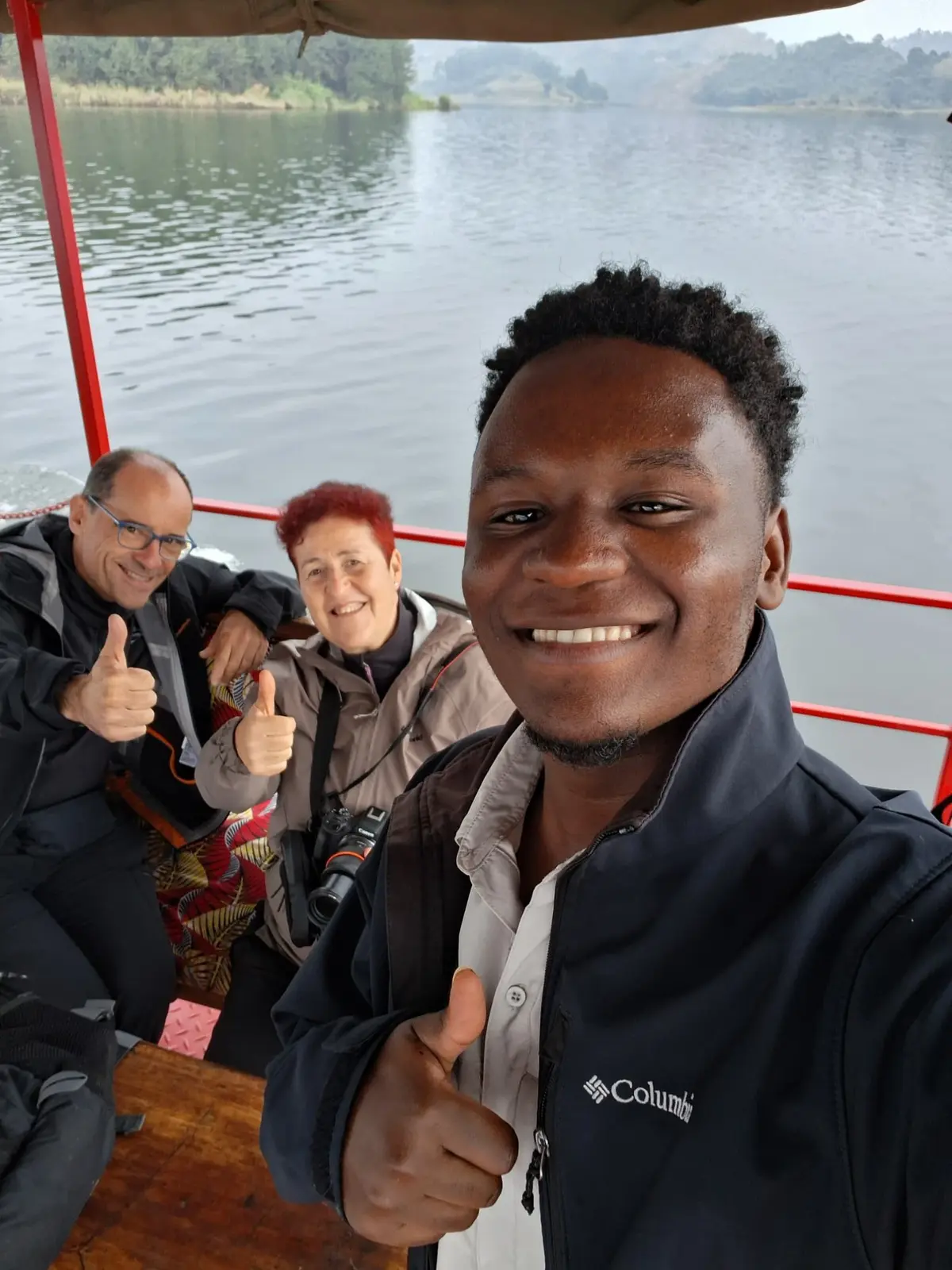 Ian Arinda guiding guests on a boat journey